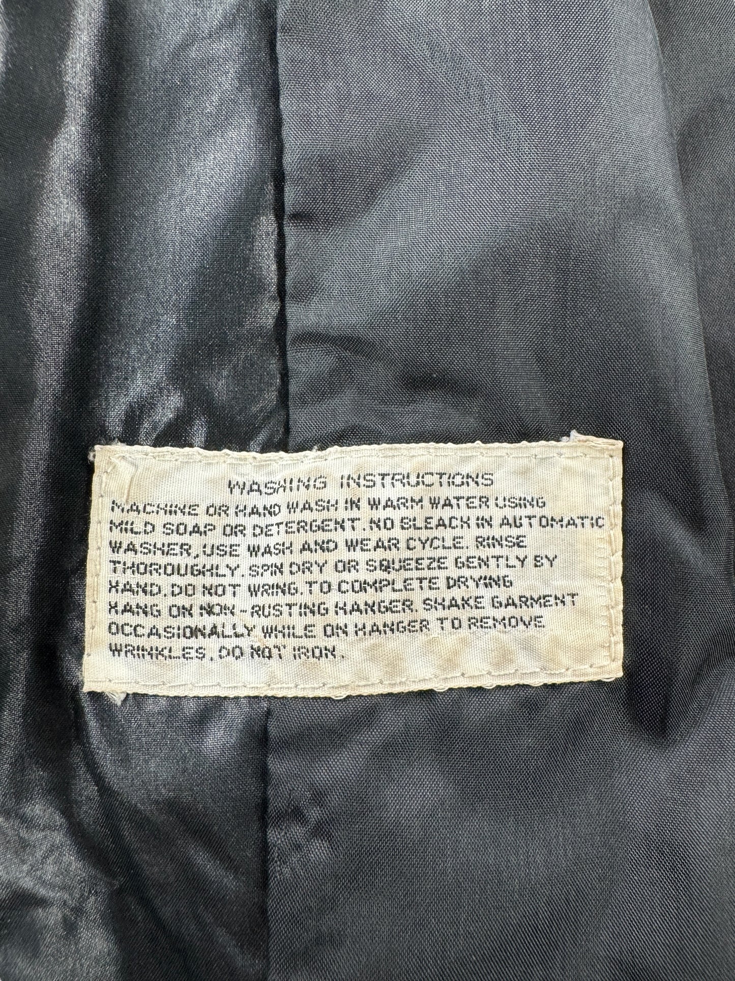 Care Tag on Vintage Budgie Band Jacket SZ M