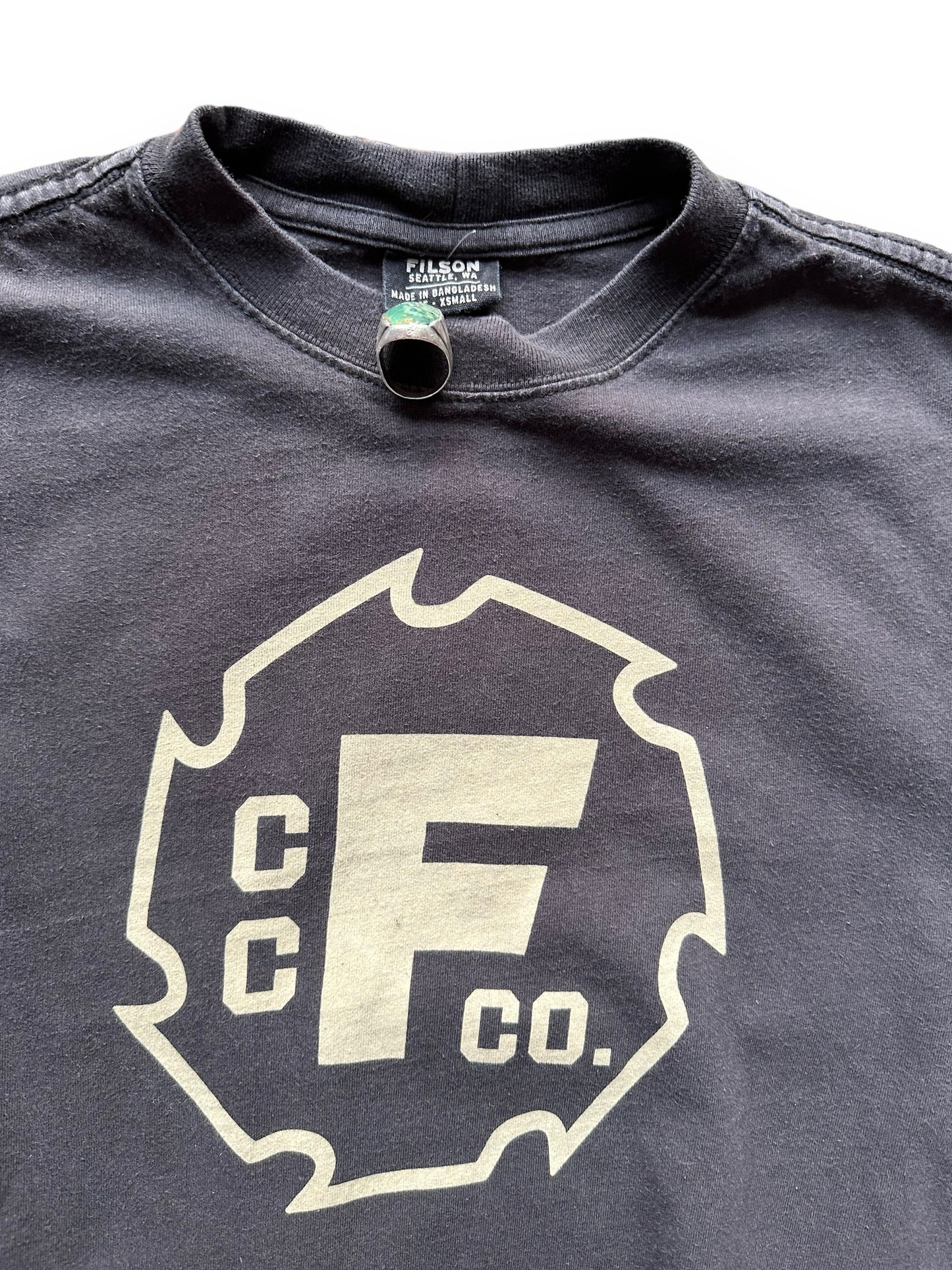 Tag View of Filson Black Long Sleeve Graphic Tee SZ XS | Barn Owl Vintage Goods | Vintage Filson Workwear Seattle