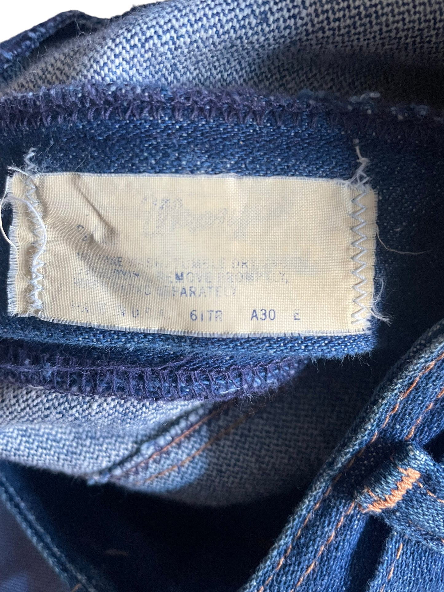 Tag view of Vintage 1970s Wide Leg Ladies Wranglers W25 | Barn Owl Vintage Seattle | Vintage Wrangler Denim