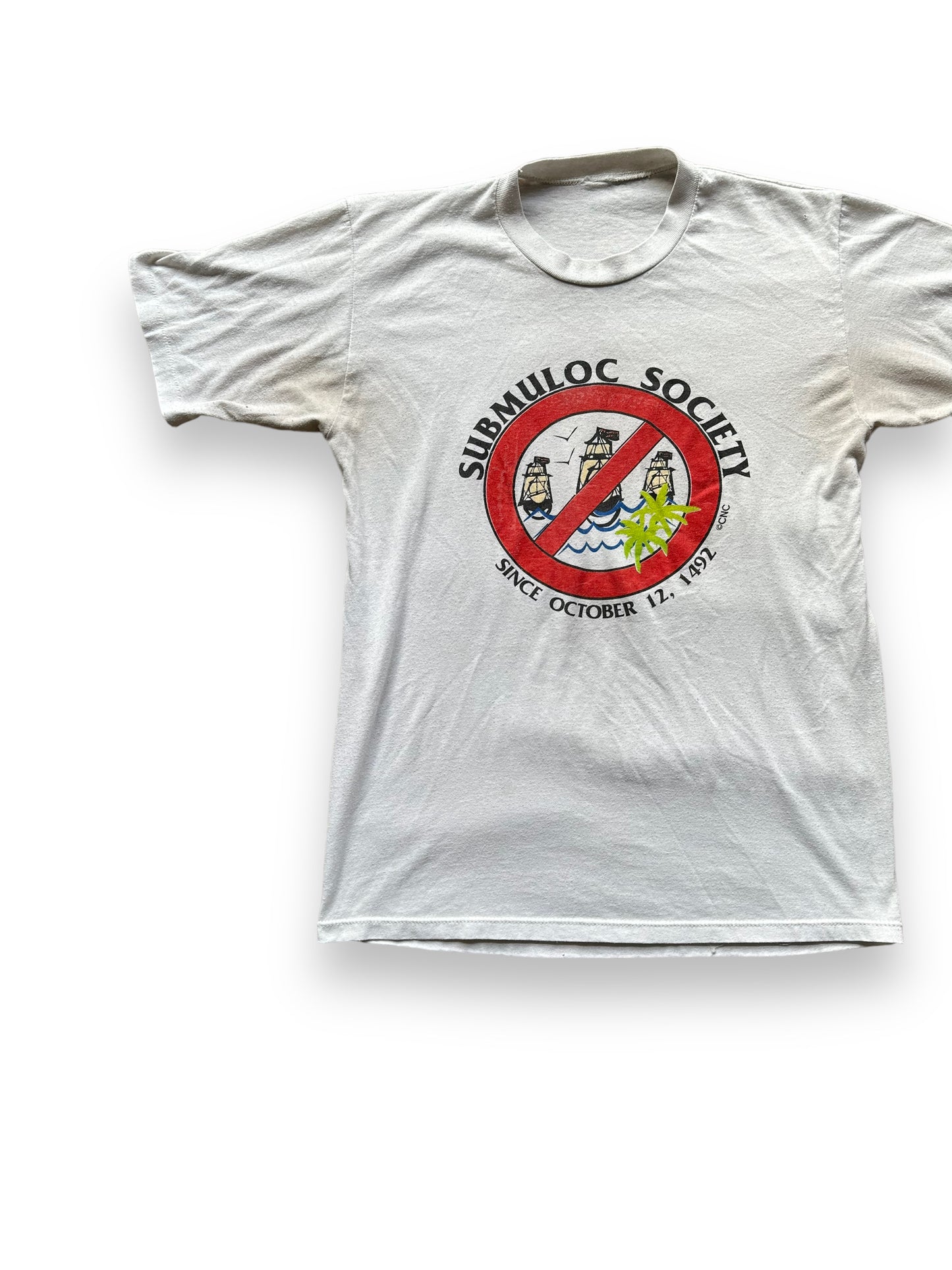 Front Right View of Vintage Submuloc First Nations Anti-Columbus Tee SZ M | Vintage Graphic T-Shirts Seattle | Barn Owl Vintage Tees Seattle