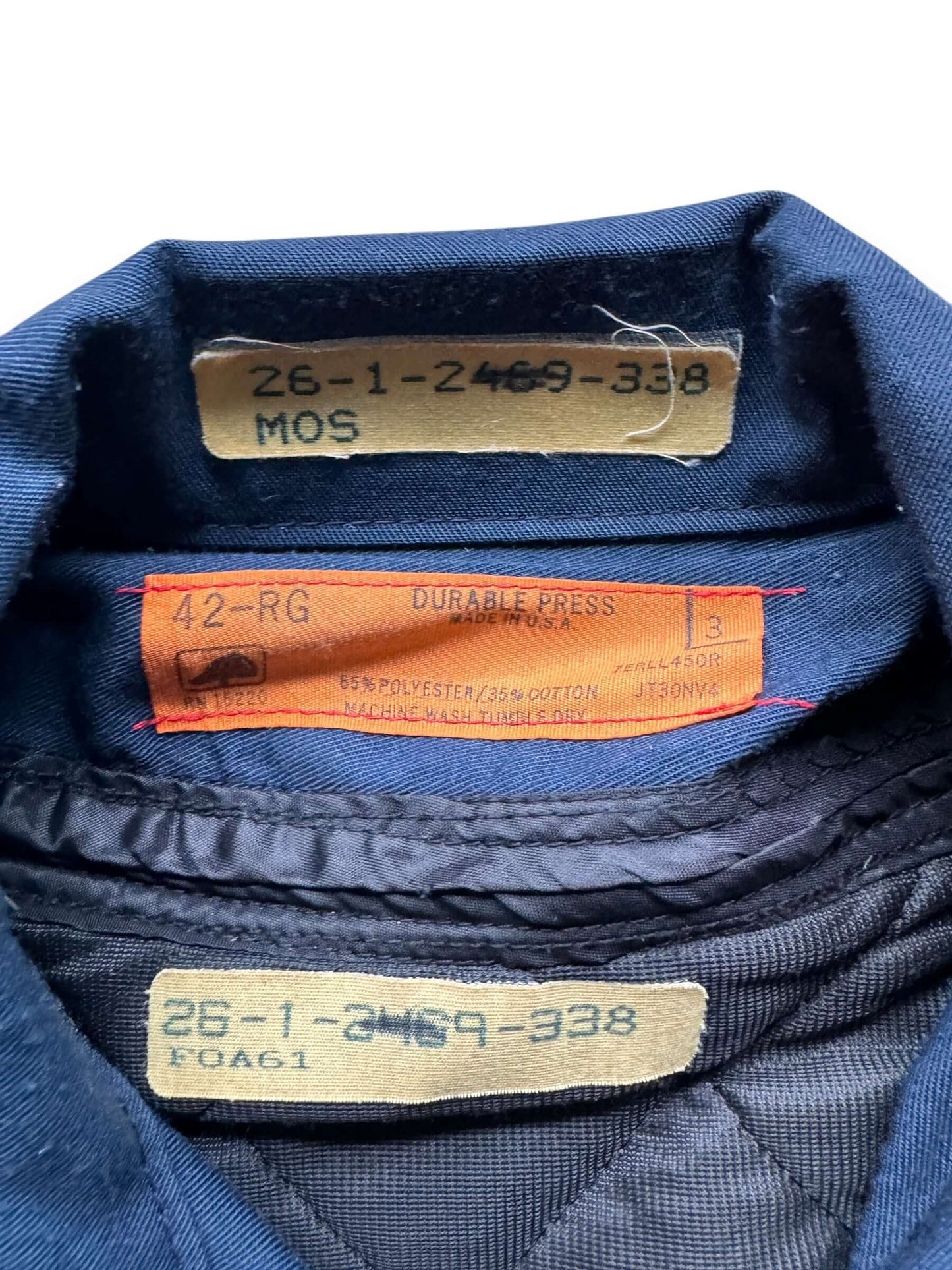 tag on Vintage MG Brassard Quilted Lined Gas Station Jacket SZ 42 RG