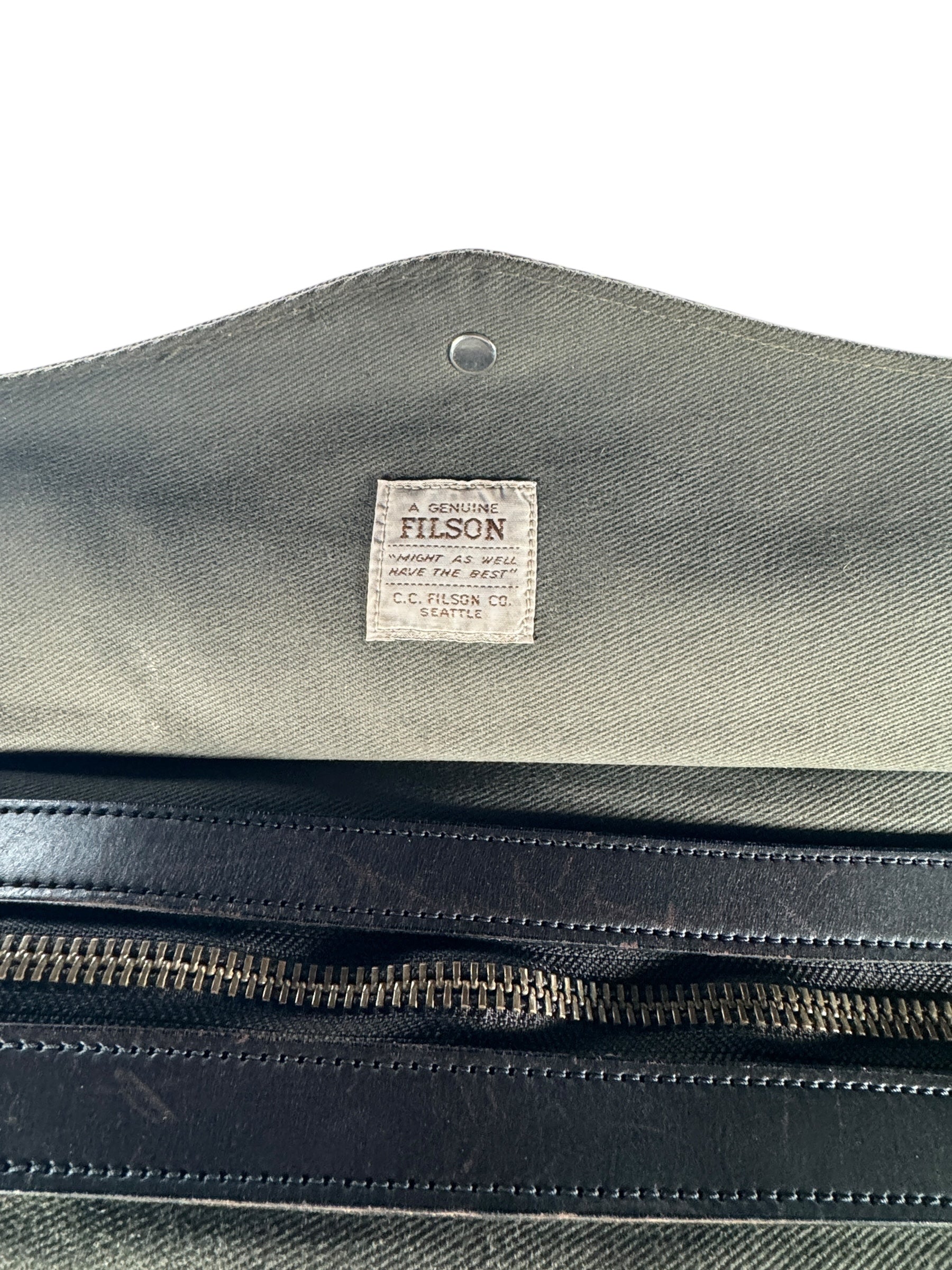 Tag View of Filson Otter Green Rugged Twill Medium Duffle