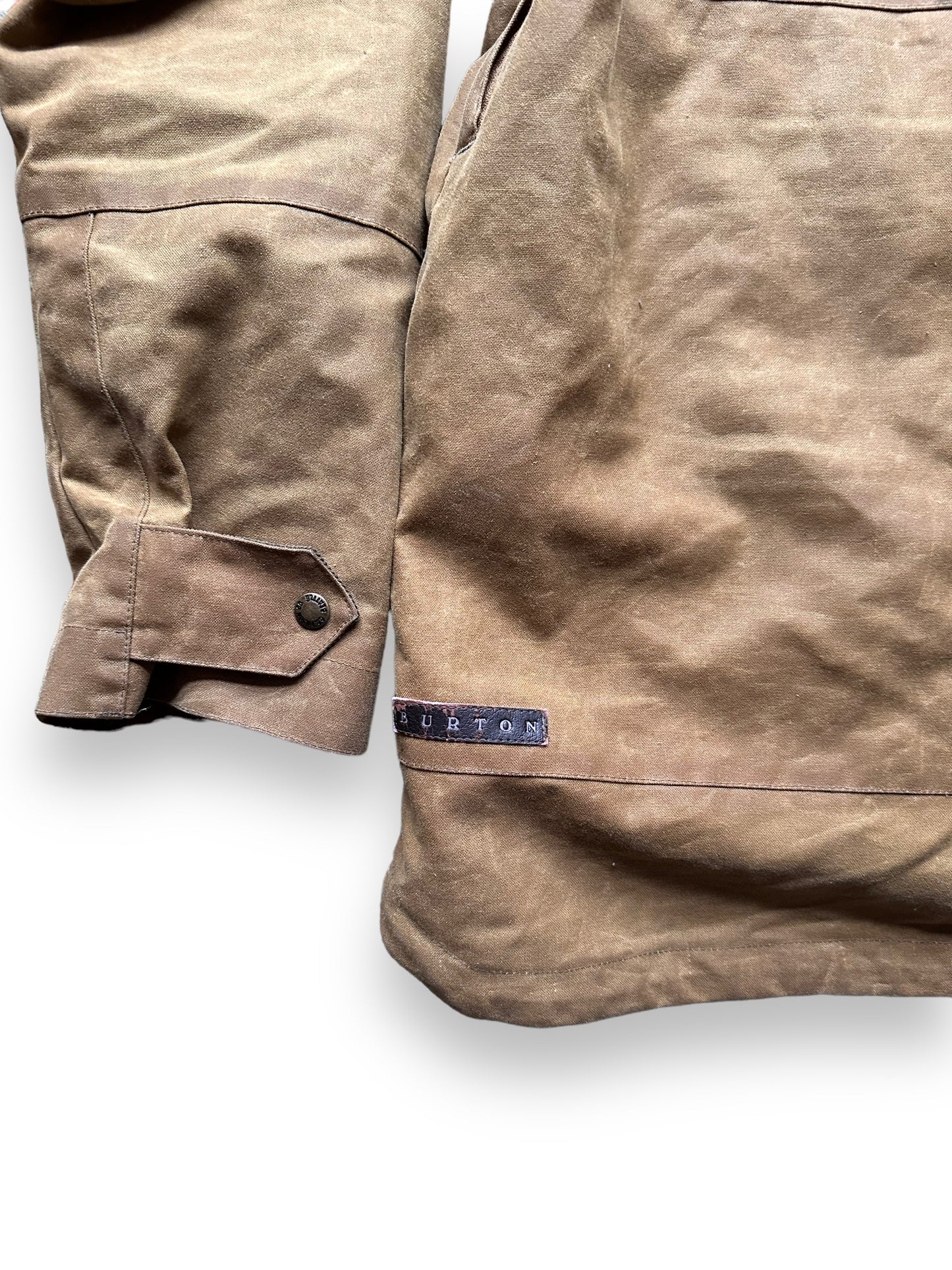 Rear Left Burton Tag on Filson X Burton Sentry Snowboarding Jacket SZ L | Barn Owl Vintage Goods | Filson Workwear Seattle