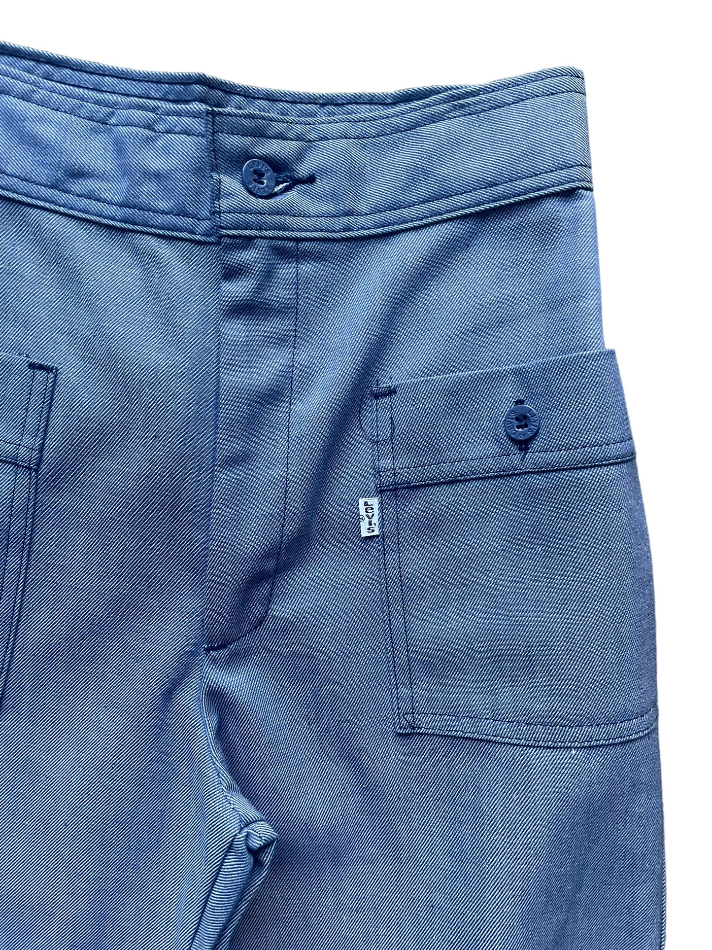Front left waist view of Vintage 1970s Deadstock Levi's Wide Leg Trousers W25 | Barn Owl Vintage Seattle | Vintage Denim
