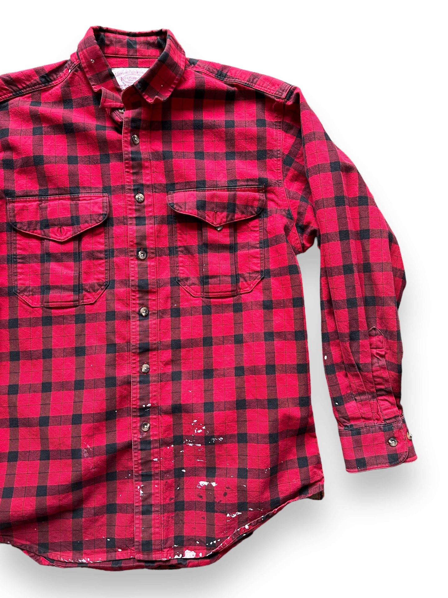 Front Left View of Paint Splattered Filson Black and Red Guide Shirt SZ M | Barn Owl Vintage Goods | Vintage Filson Workwear Seattle