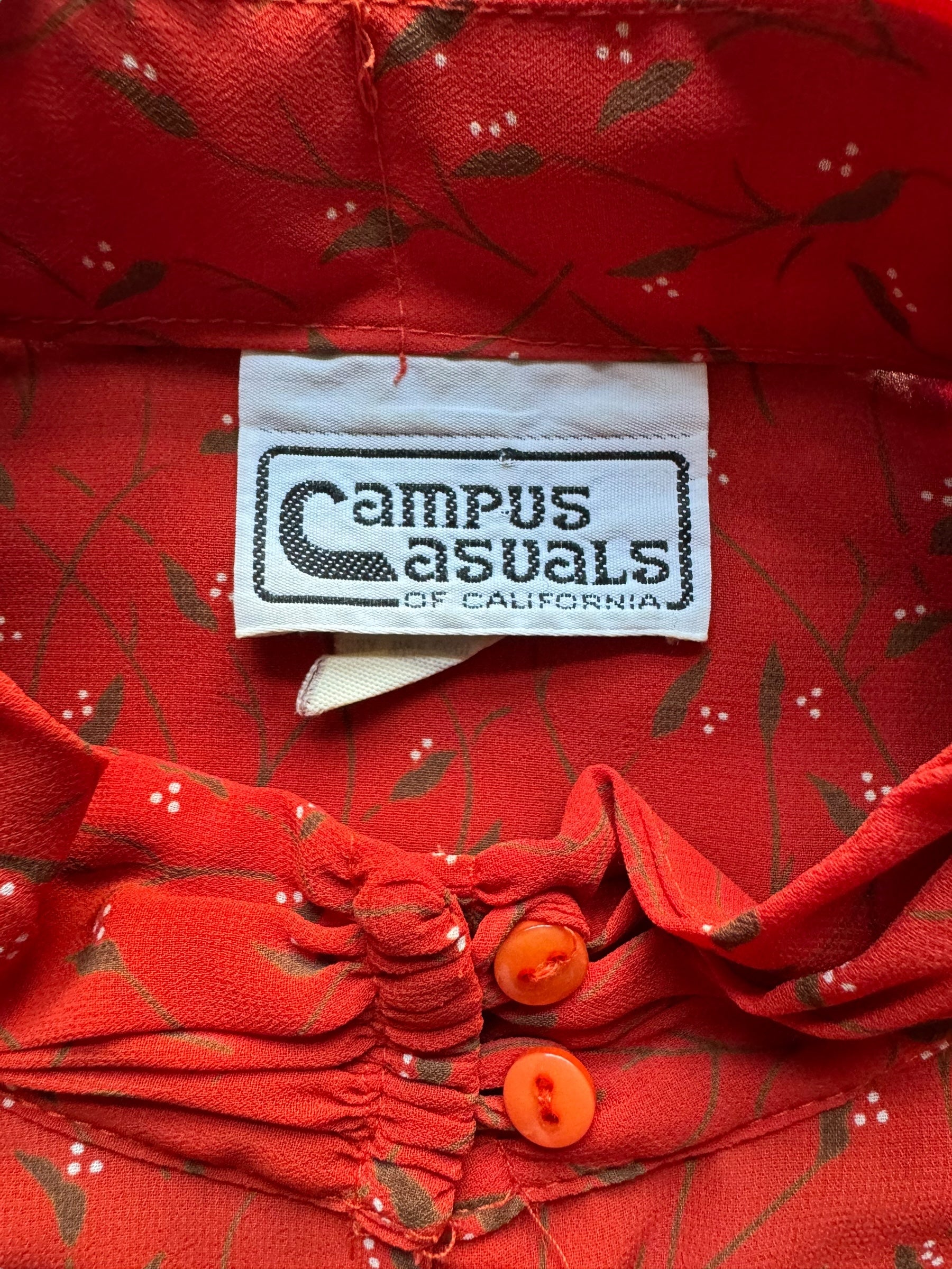 Tag view of 1980s Campus Casuals Red Floral Blouse L