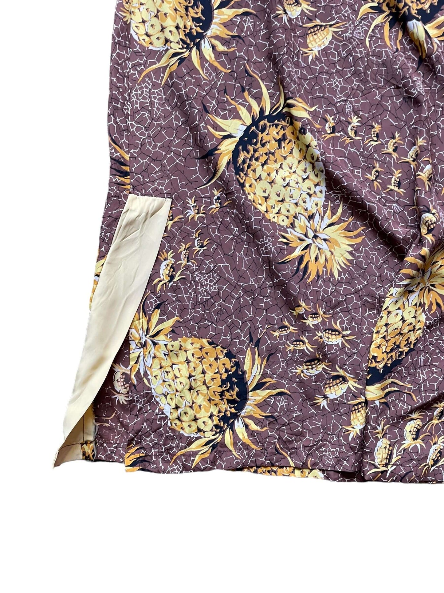 Left side slit of 1940s Malihini Rayon Pineapple Dress XS-S