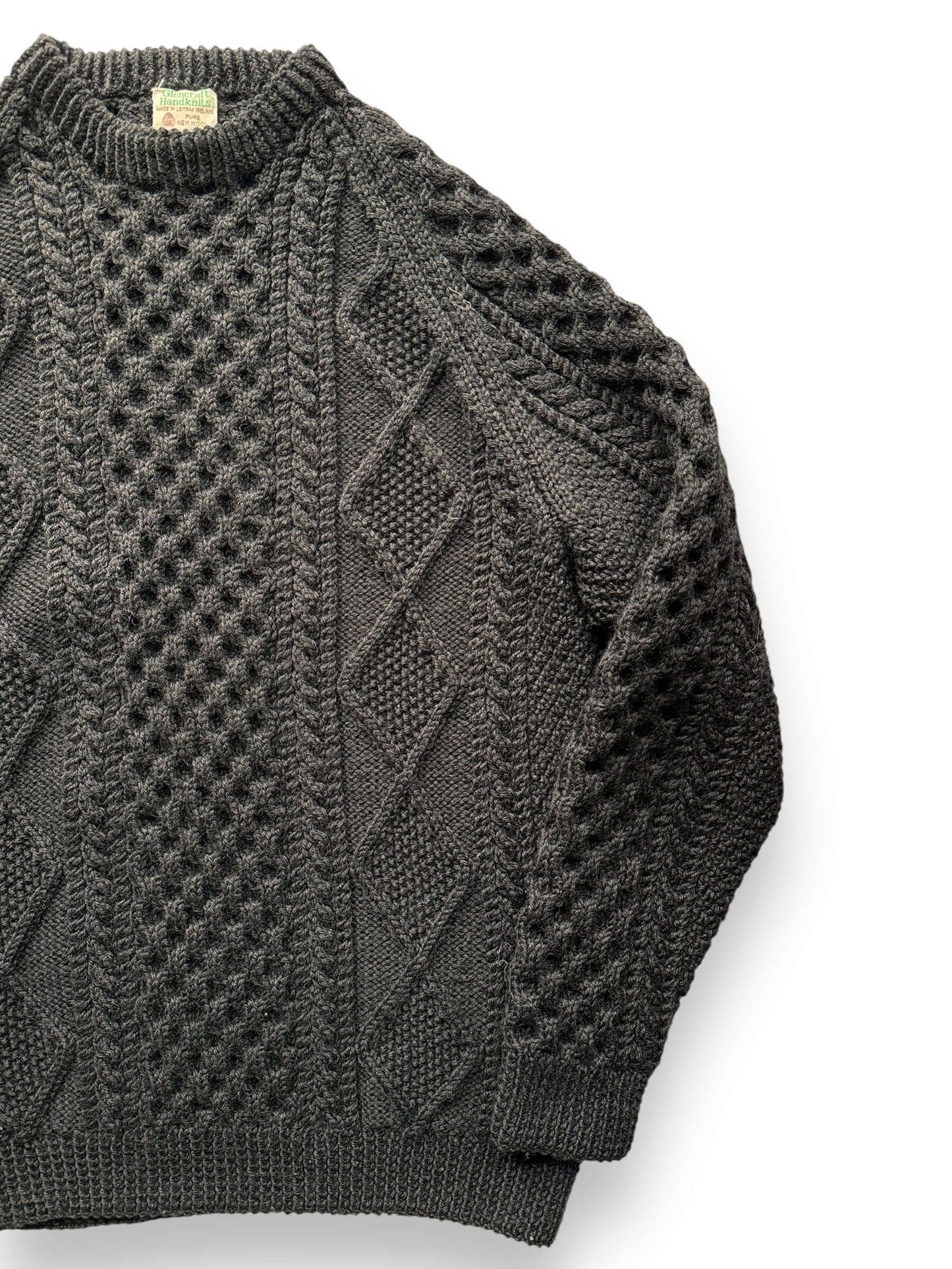 front left of Vintage Black Glencraft Handknits Irish Wool Sweater SZ L