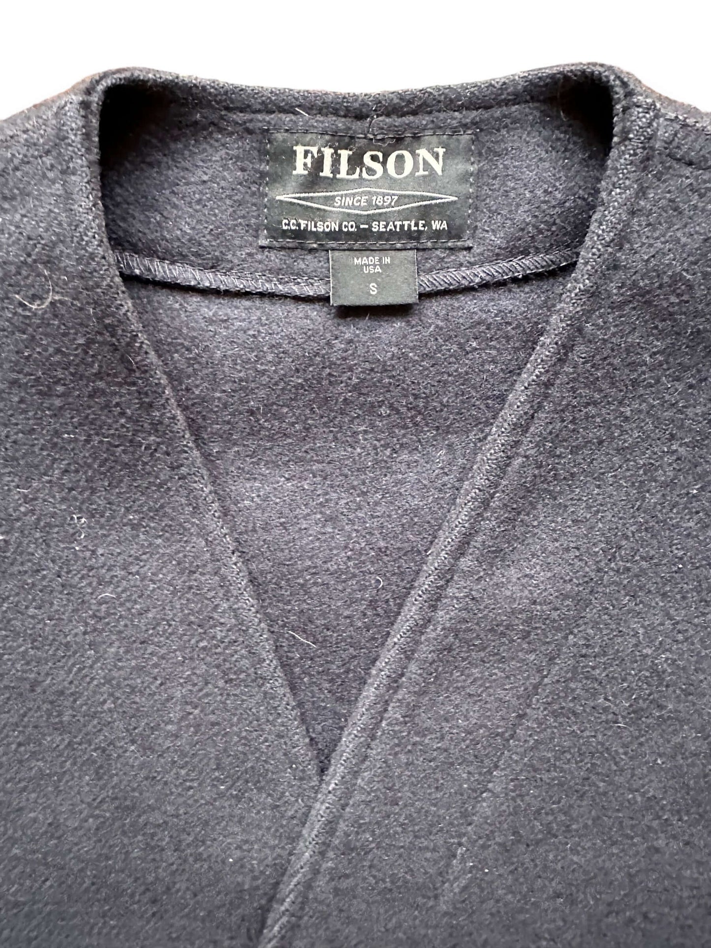 Tag View of Black Label Filson Mackinaw Wool Vest SZ S | Barn Owl Vintage Goods | Filson Bargain Outlet Seattle