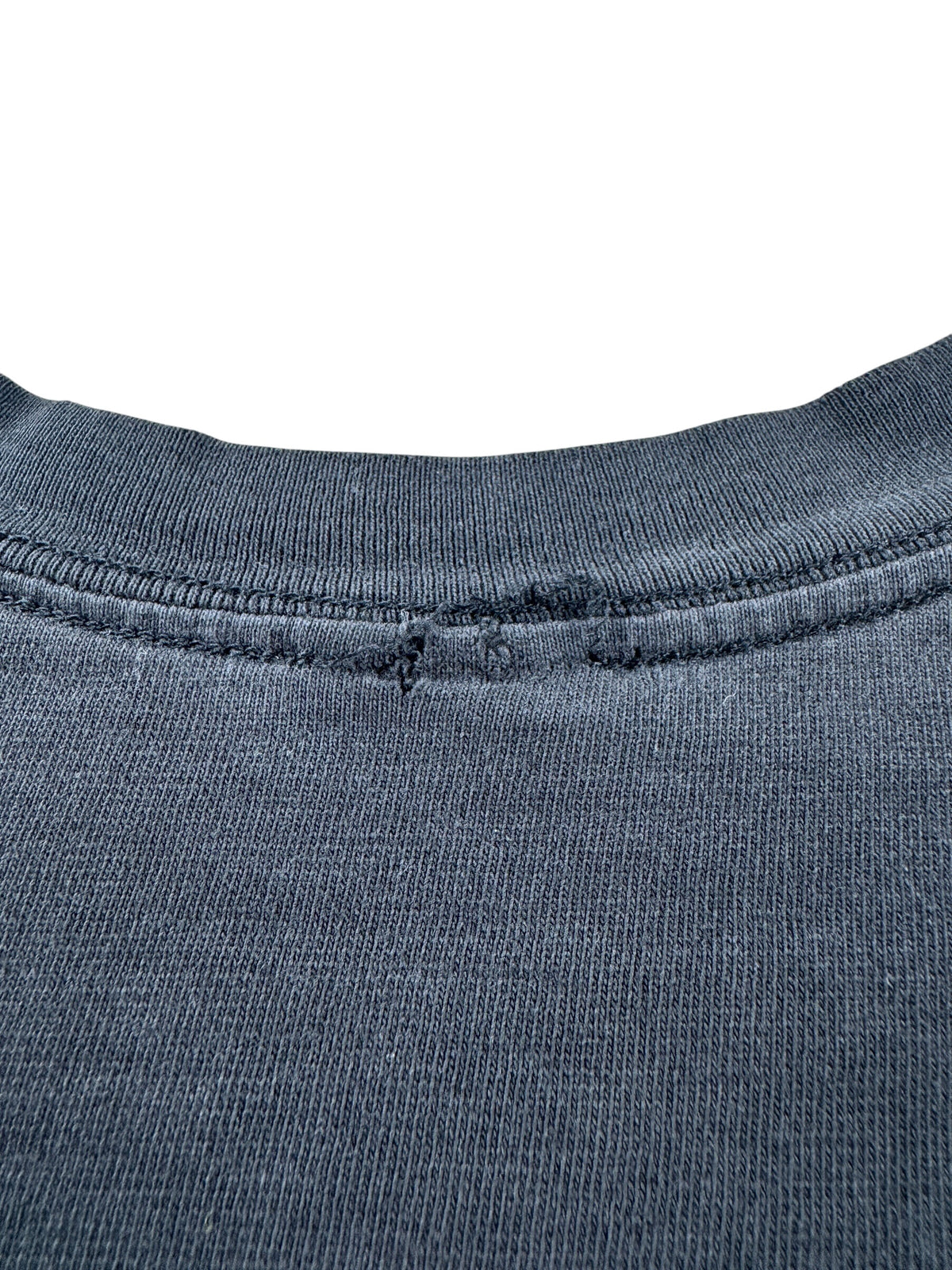 Wear on back collar of Vintage Black Blank Tee SZ XL