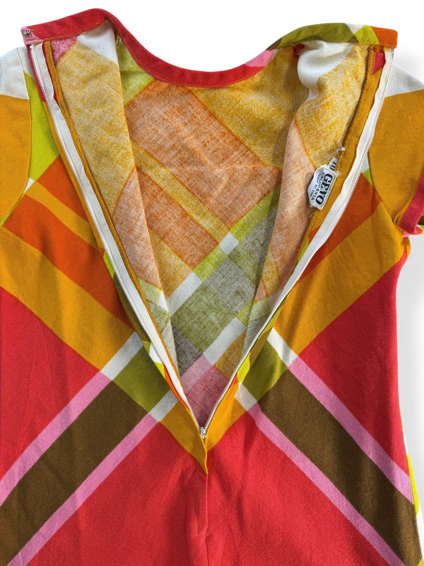 Open back of 1960 Geno Colorful Plaid Mini S