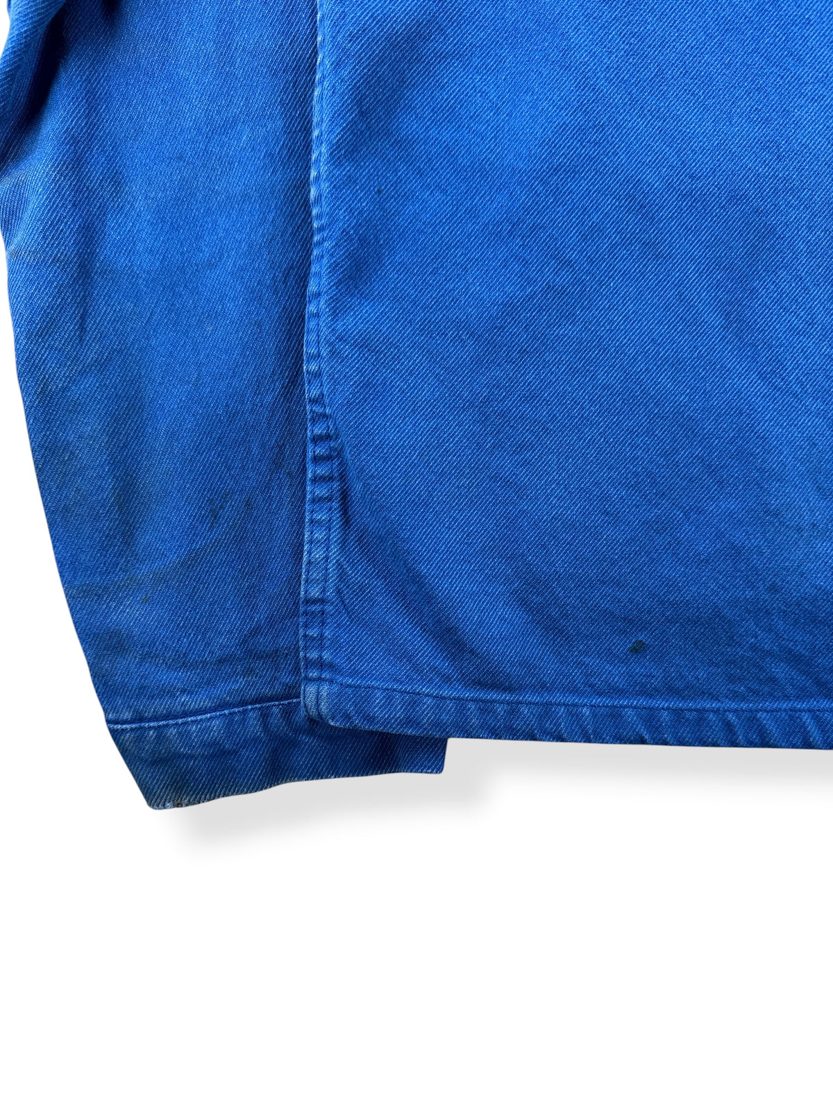 Small stains near bottom hem of Vintage Cobalt Blue French Chore Coat SZ M