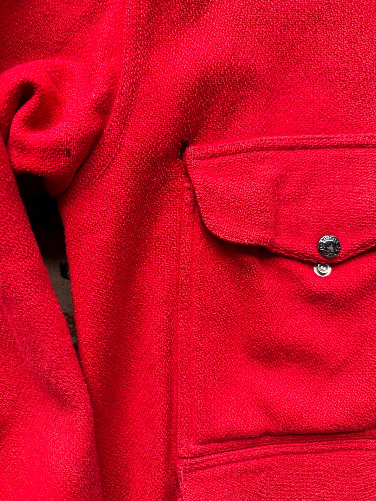 small holes in top right of Vintage 60s Era Union Made Filson Scarlet Cruiser Size 44 | Barn Owl Vintage Goods | Vintage Filson Workwear Seattle
