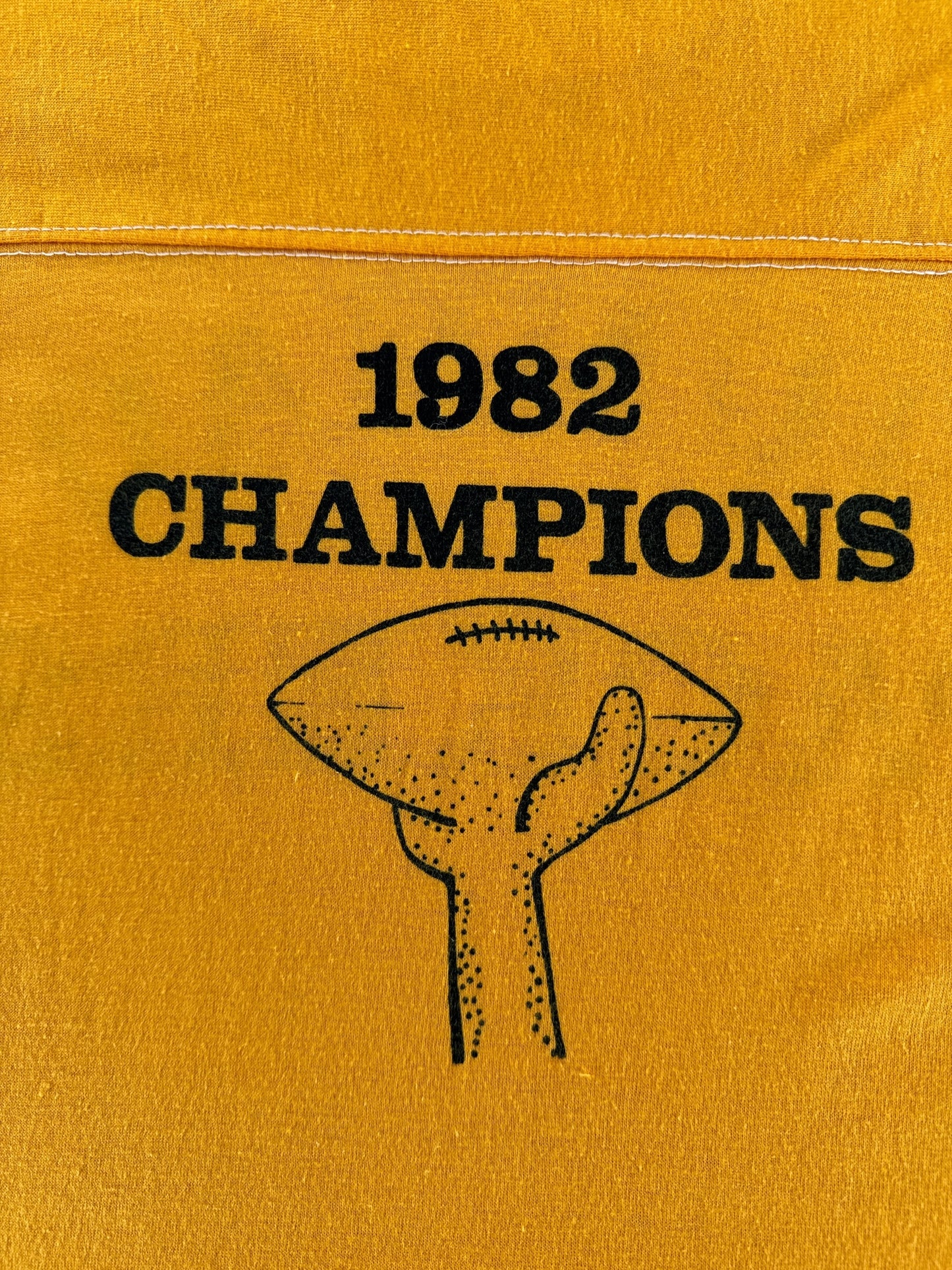 Back Graphic of Vintage Juneau Packers Yellow Jersey SZ S