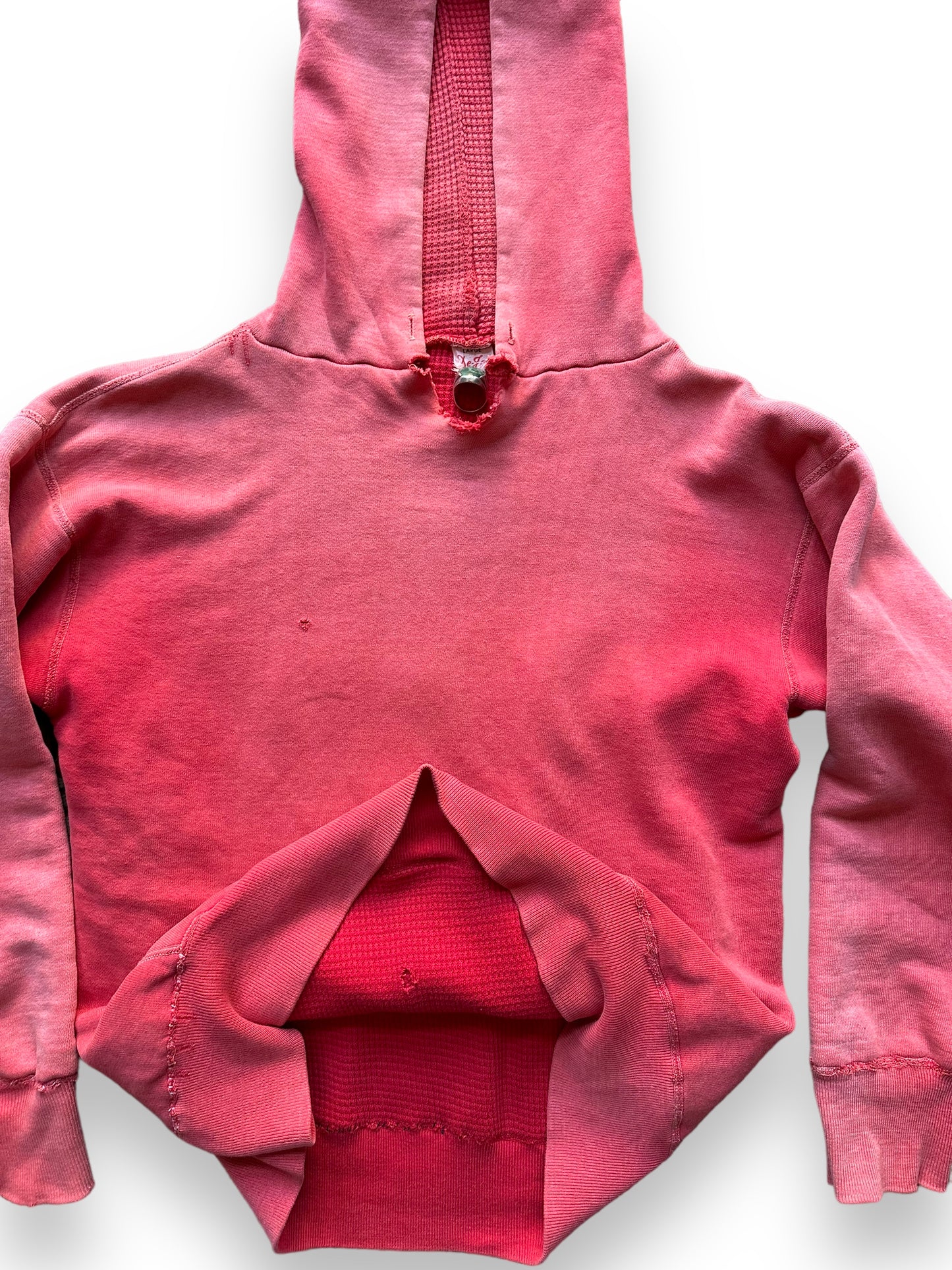 Inside view of waffle insulation on Vintage Red De Jac Waffle Lined Hooded Sweatshirt SZ L | Vintage Waffle Sweatshirt Seattle | Barn Owl Vintage Clothing