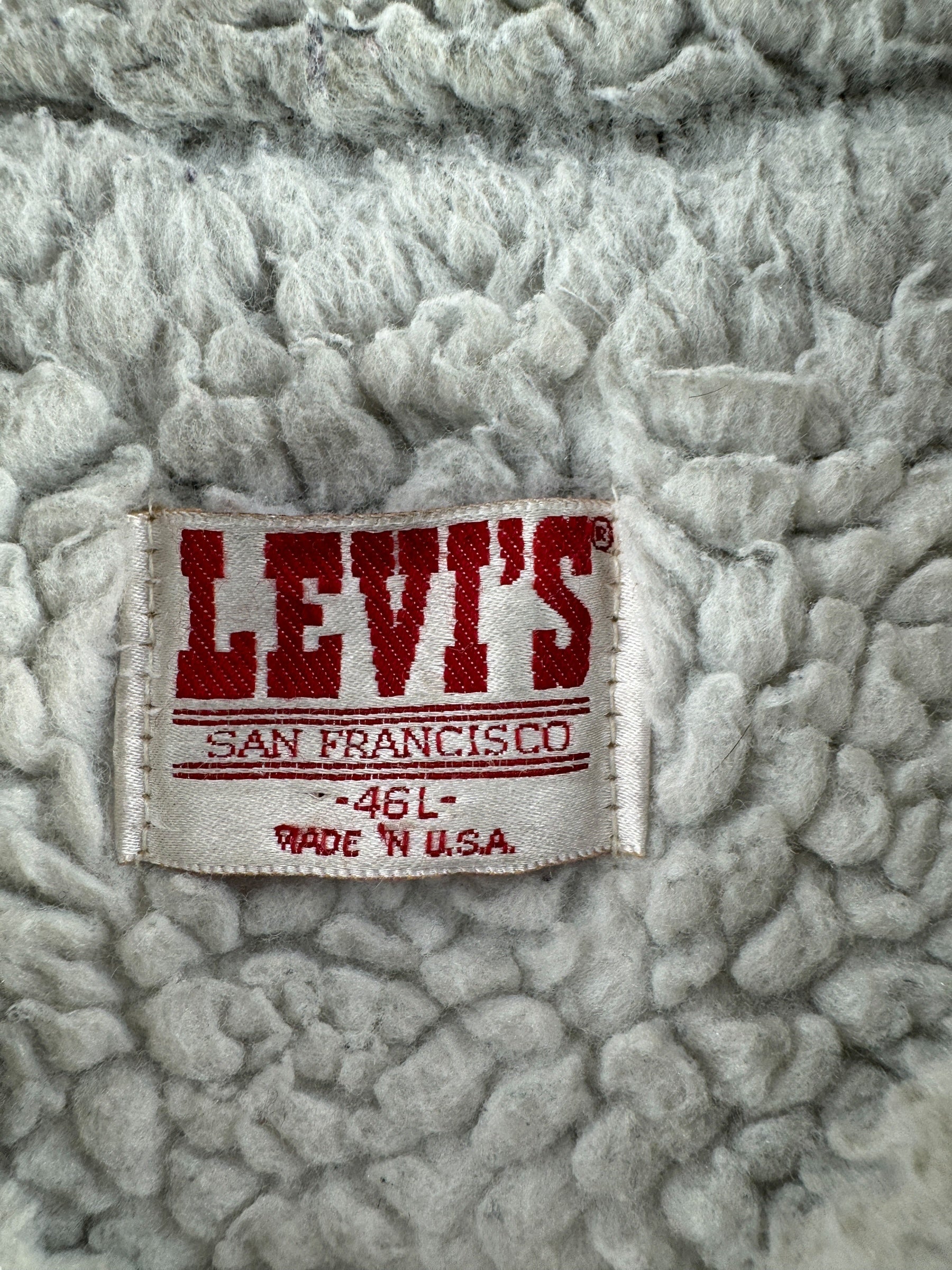 Label on Vintage Levi's Shearling Lined Denim Trucker SZ 46L