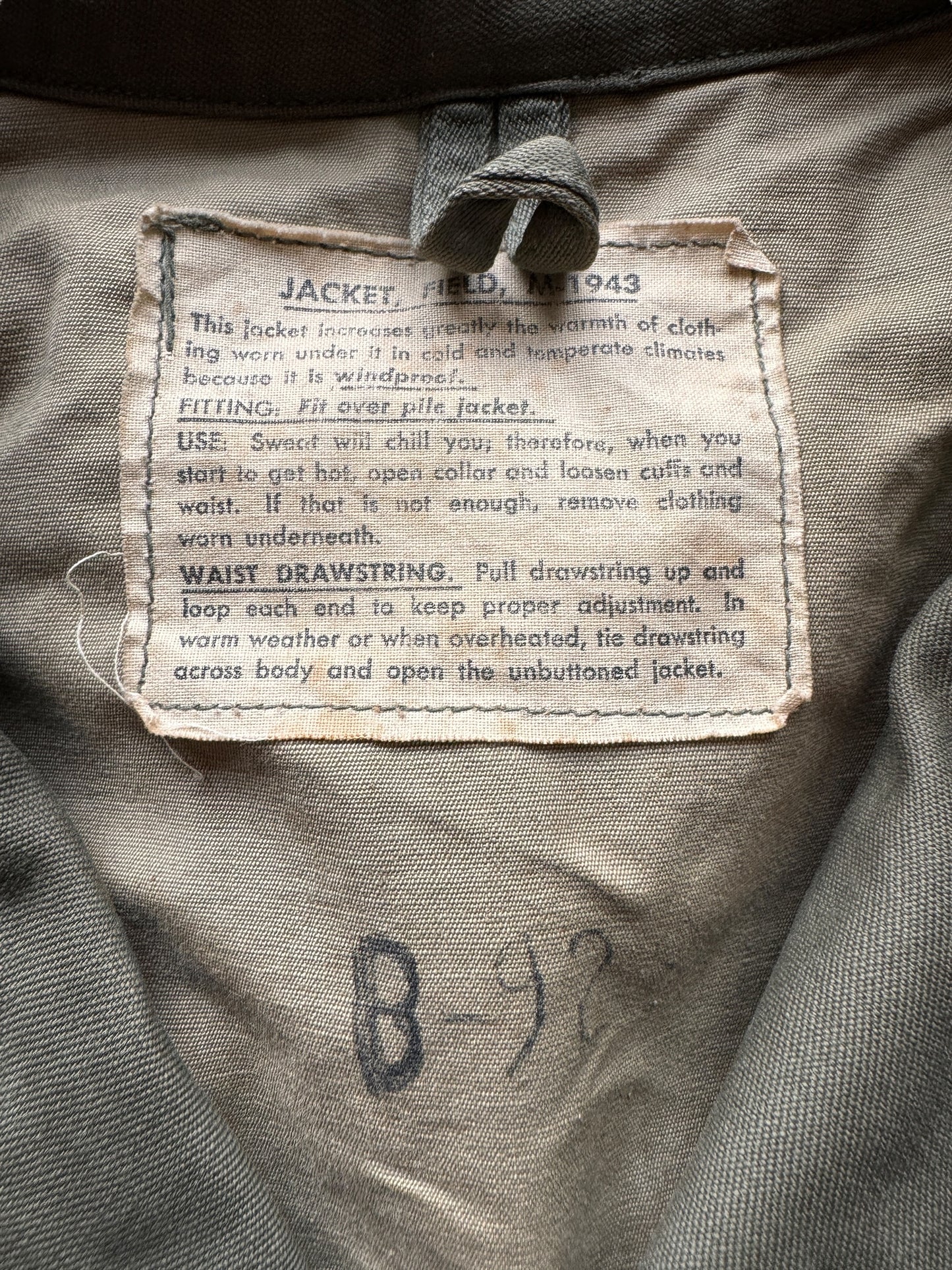 tag on Vintage WWII Era M-1943 Field Jacket SZ M