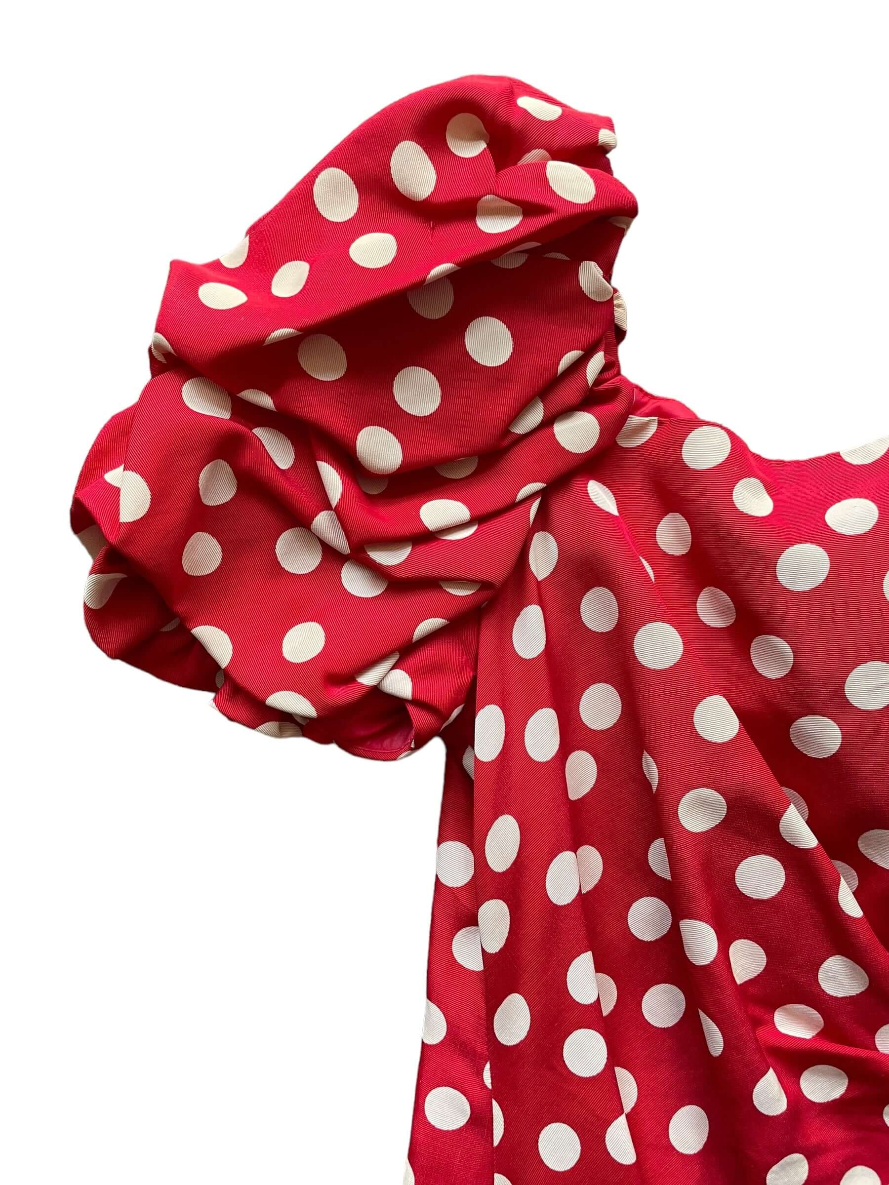 Front right sleeve view of 1980s Poofy Red Polka Dot Wiggle Dress M-L