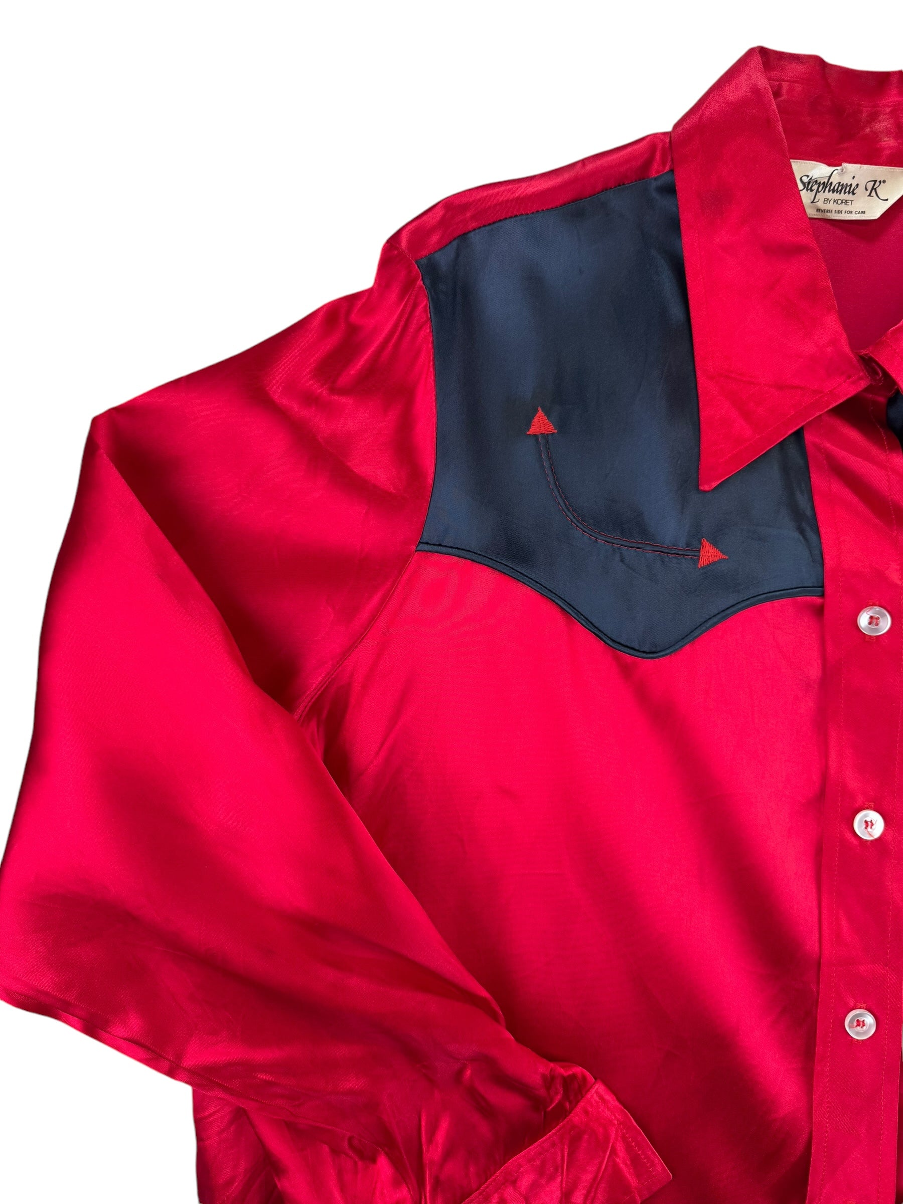 Front right shoulder of 1980s Red and Black Satin Western Pearl Snap Shirt XL