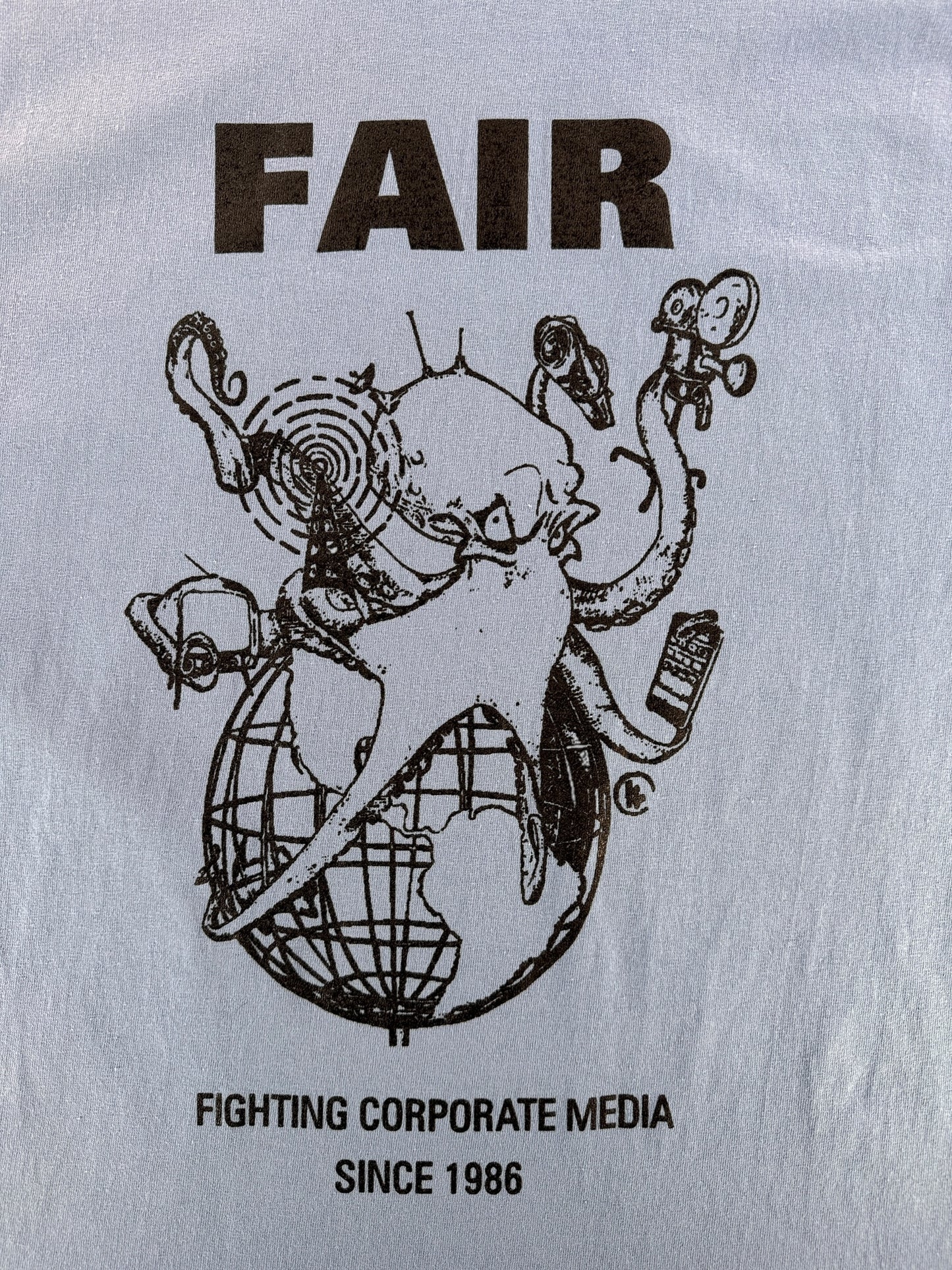 Front Graphic of Modern FAIR Media Tee SZ XL