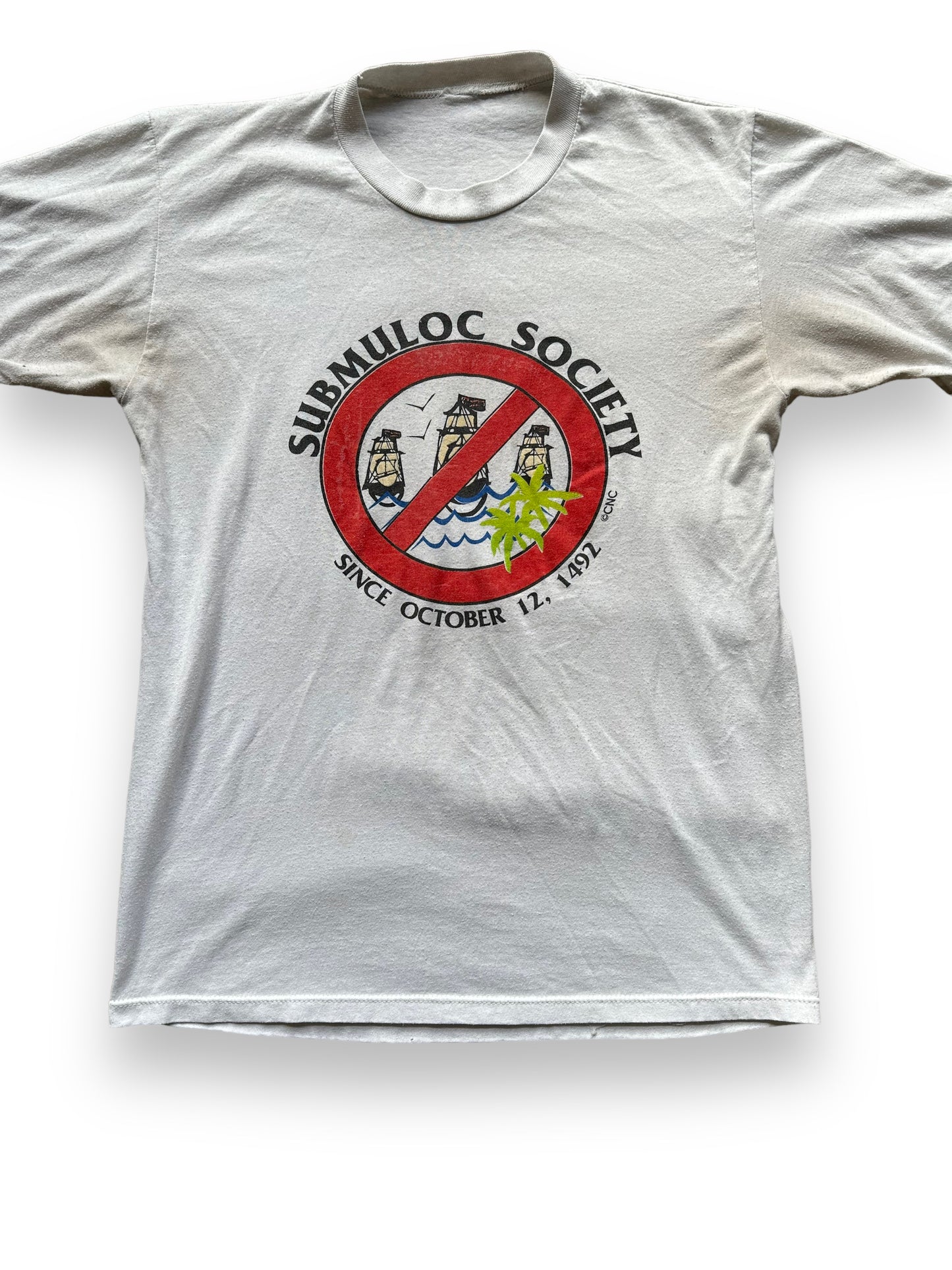 Front Detail on Vintage Submuloc First Nations Anti-Columbus Tee SZ M | Vintage Graphic T-Shirts Seattle | Barn Owl Vintage Tees Seattle