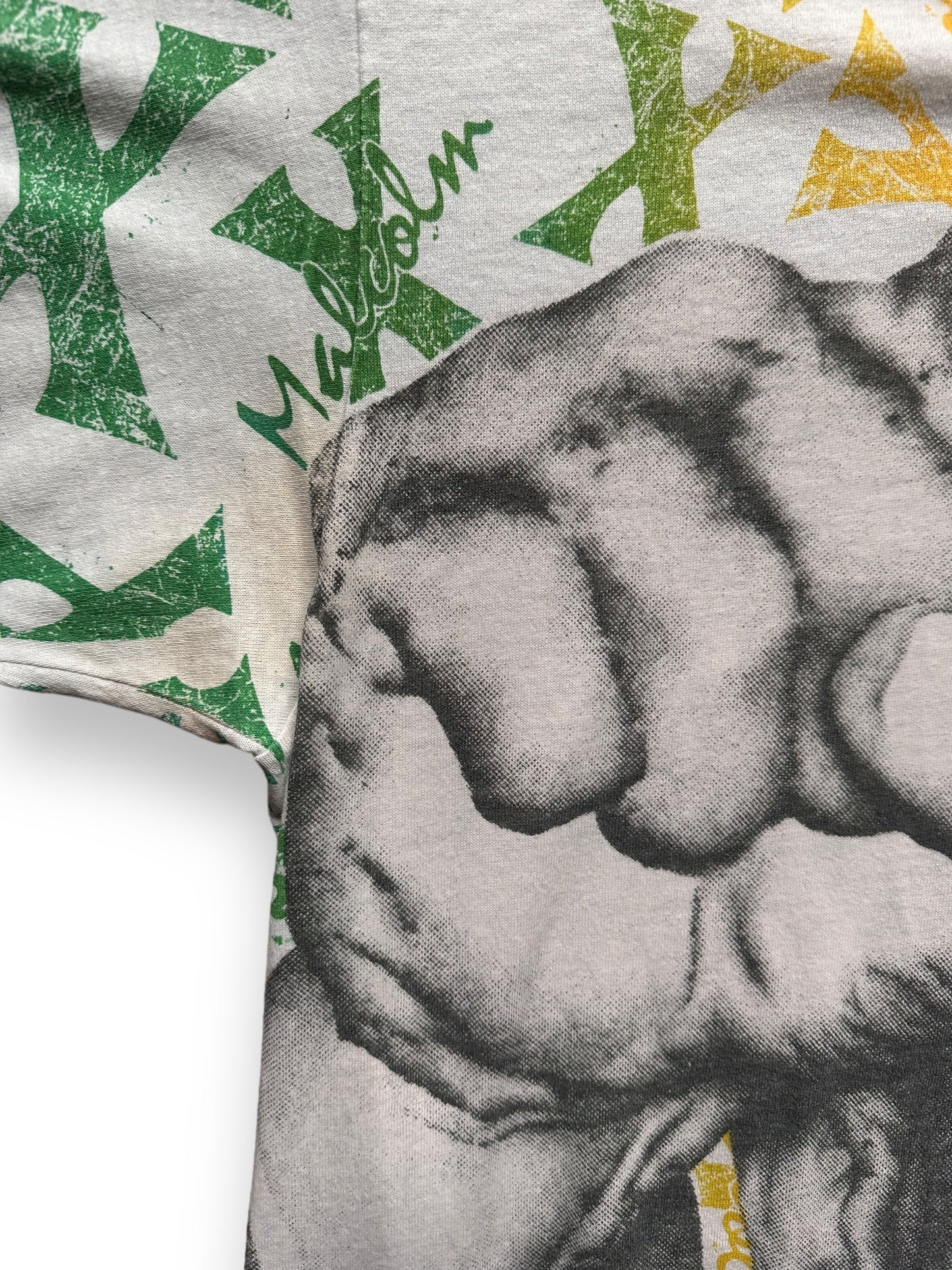 Small Bit of Pitting on Right Armpit of Vintage Malcolm X All Over Print Tee SZ L | Vintage Malcolm X T-Shirts Seattle | Barn Owl Vintage Clothing Seattle