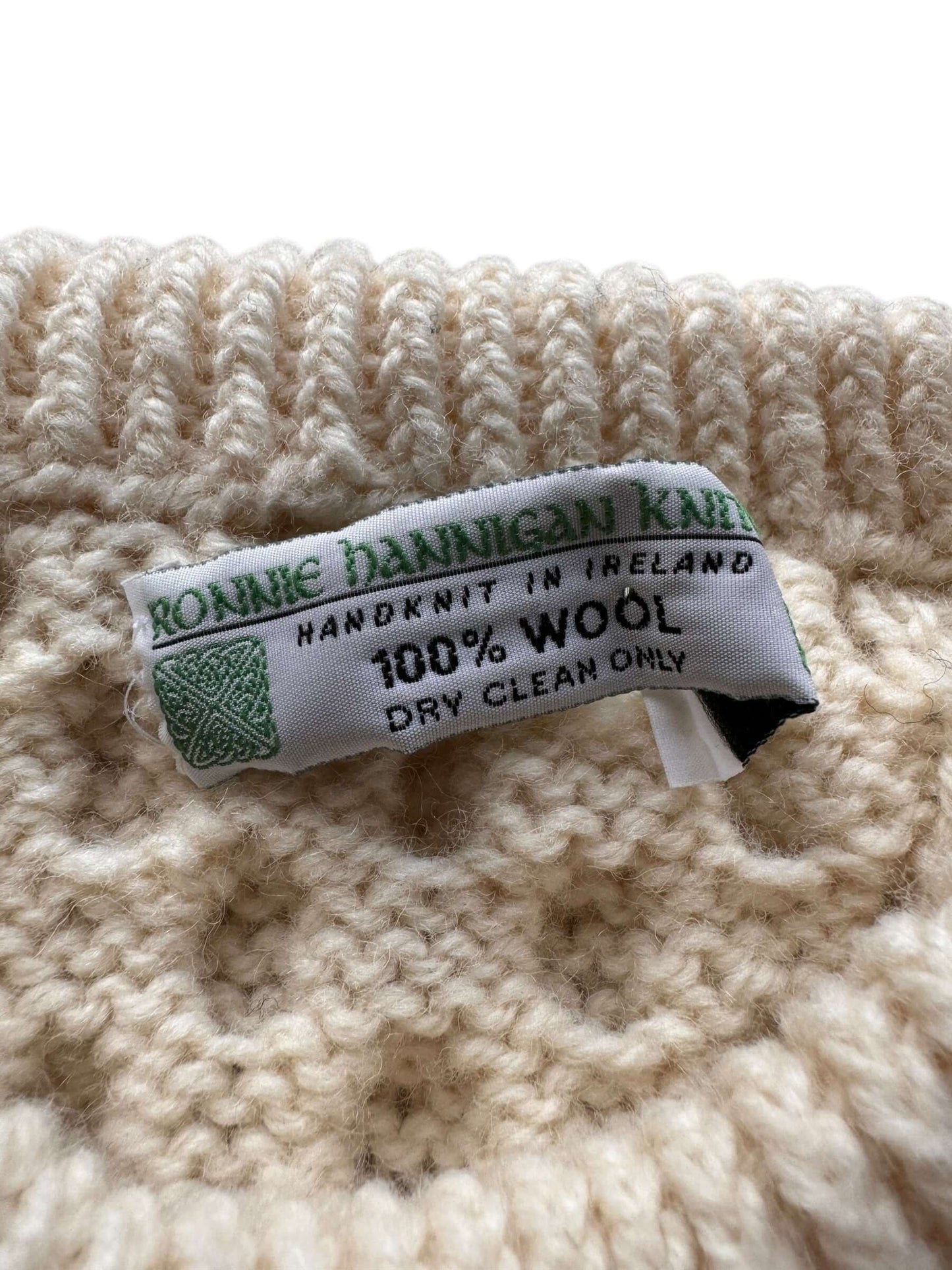 Tag of Vintage Ronnie Hannigan Cream Irish Cable Knit Fishermans Sweater SZ XL