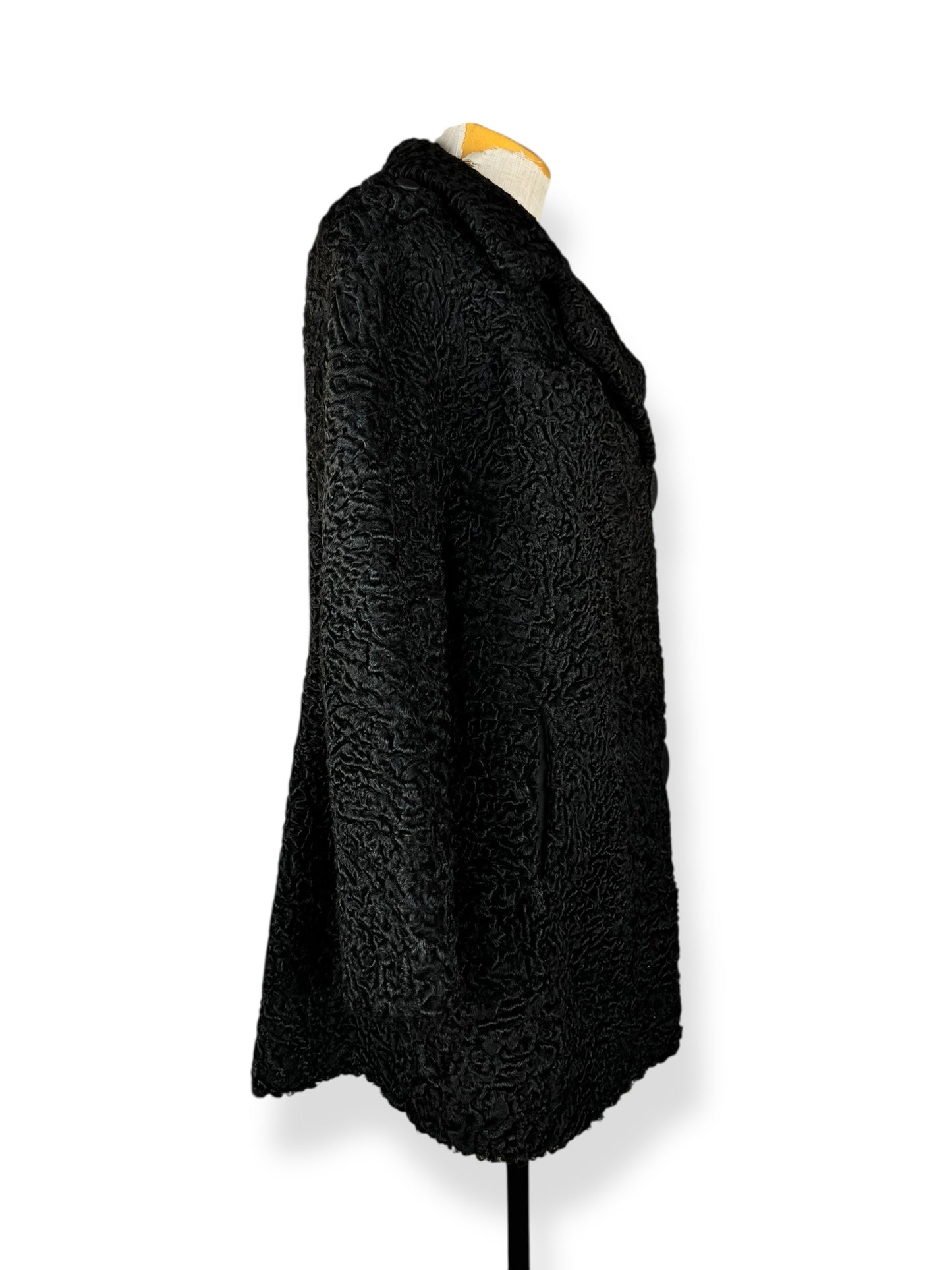 Side view of 1960s Uhlemann Furs Curly Lamb Coat L