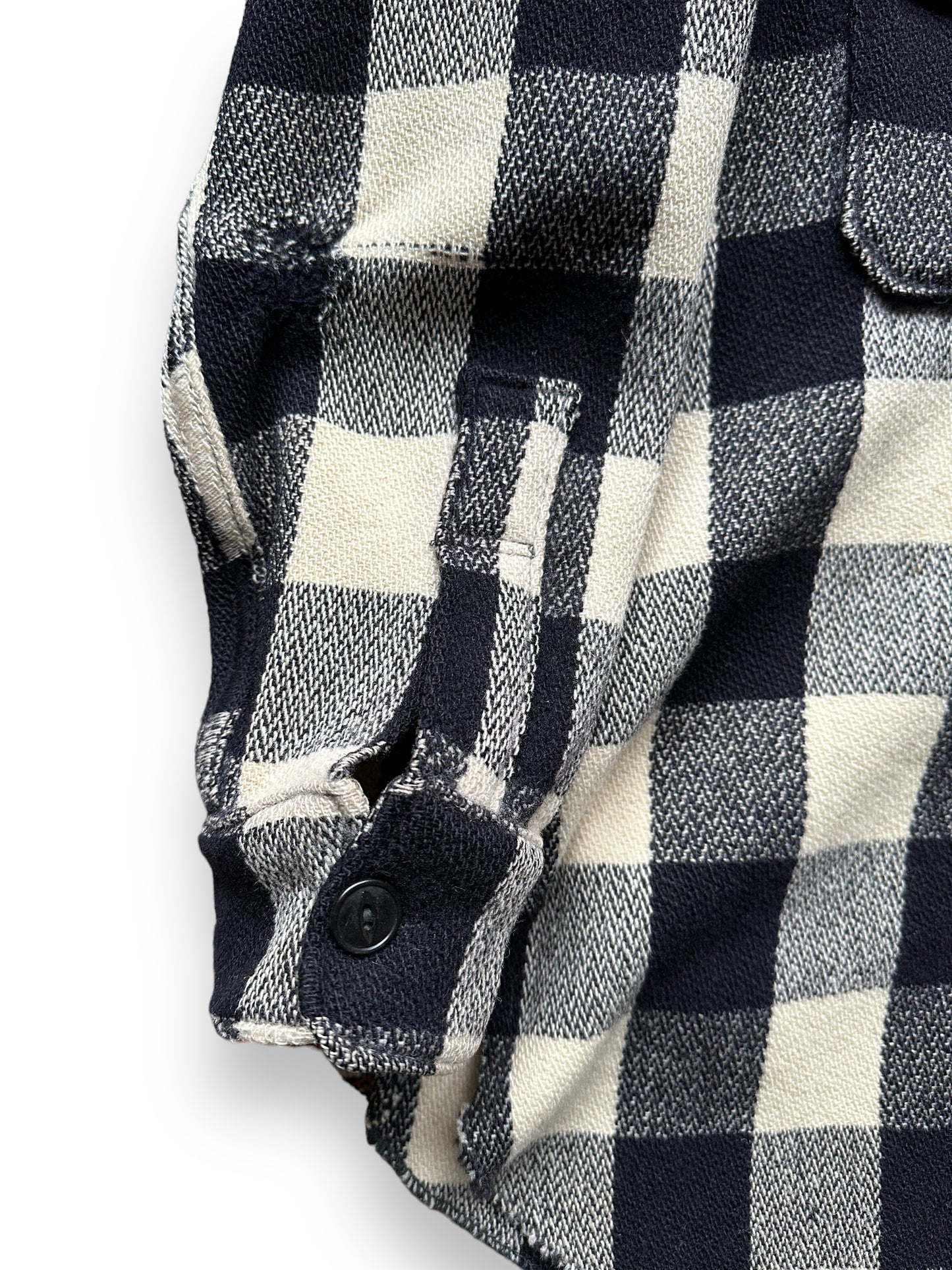 Flaws on Right Sleeve of Vintage 1930-40s Era Woolrich Black & White Wool Jacket SZ L | Barn Owl Vintage Goods | Vintage Workwear Seattle