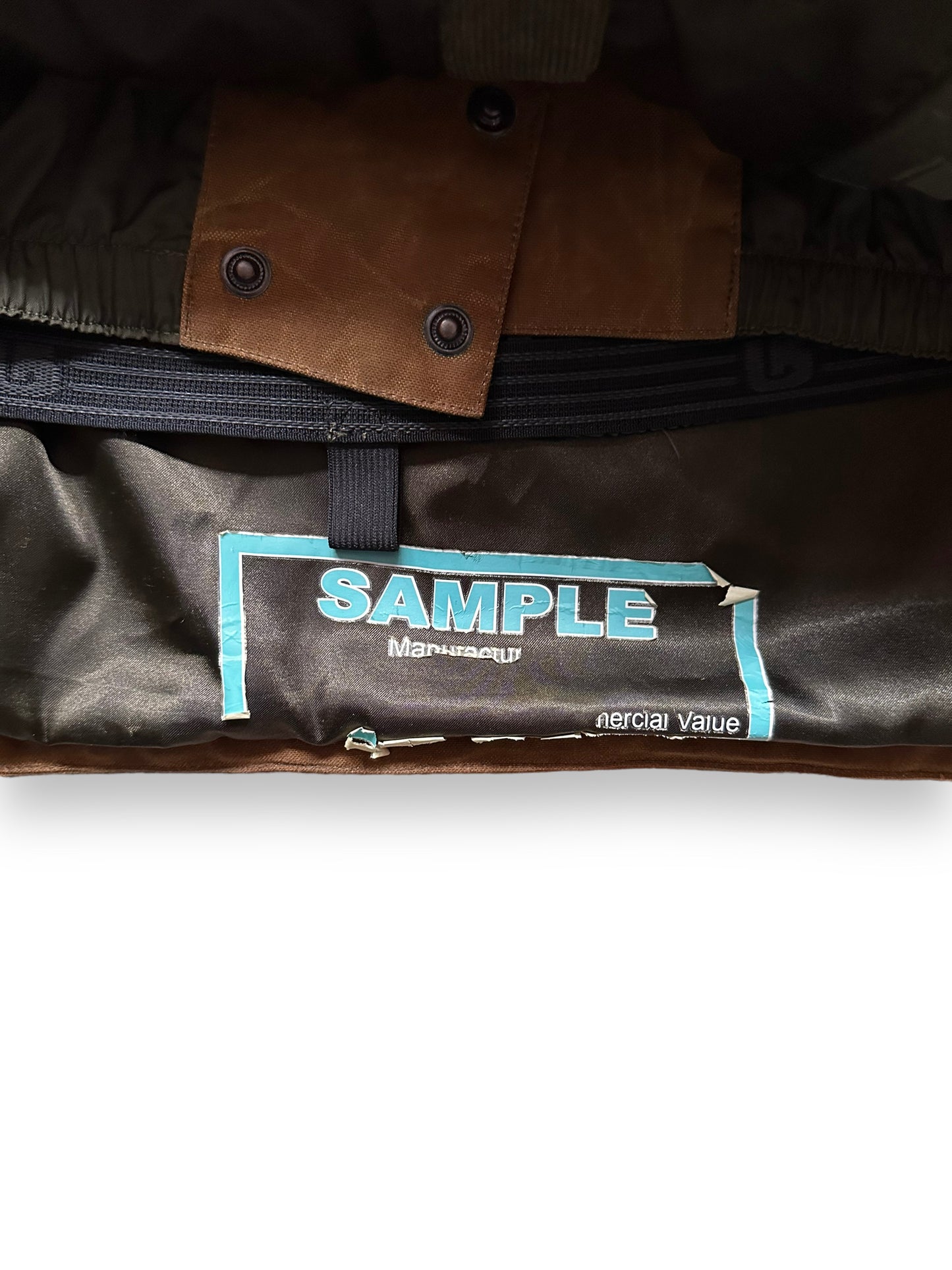 Sample Tag on Filson X Burton Sentry Snowboarding Jacket SZ L | Barn Owl Vintage Goods | Filson Workwear Seattle