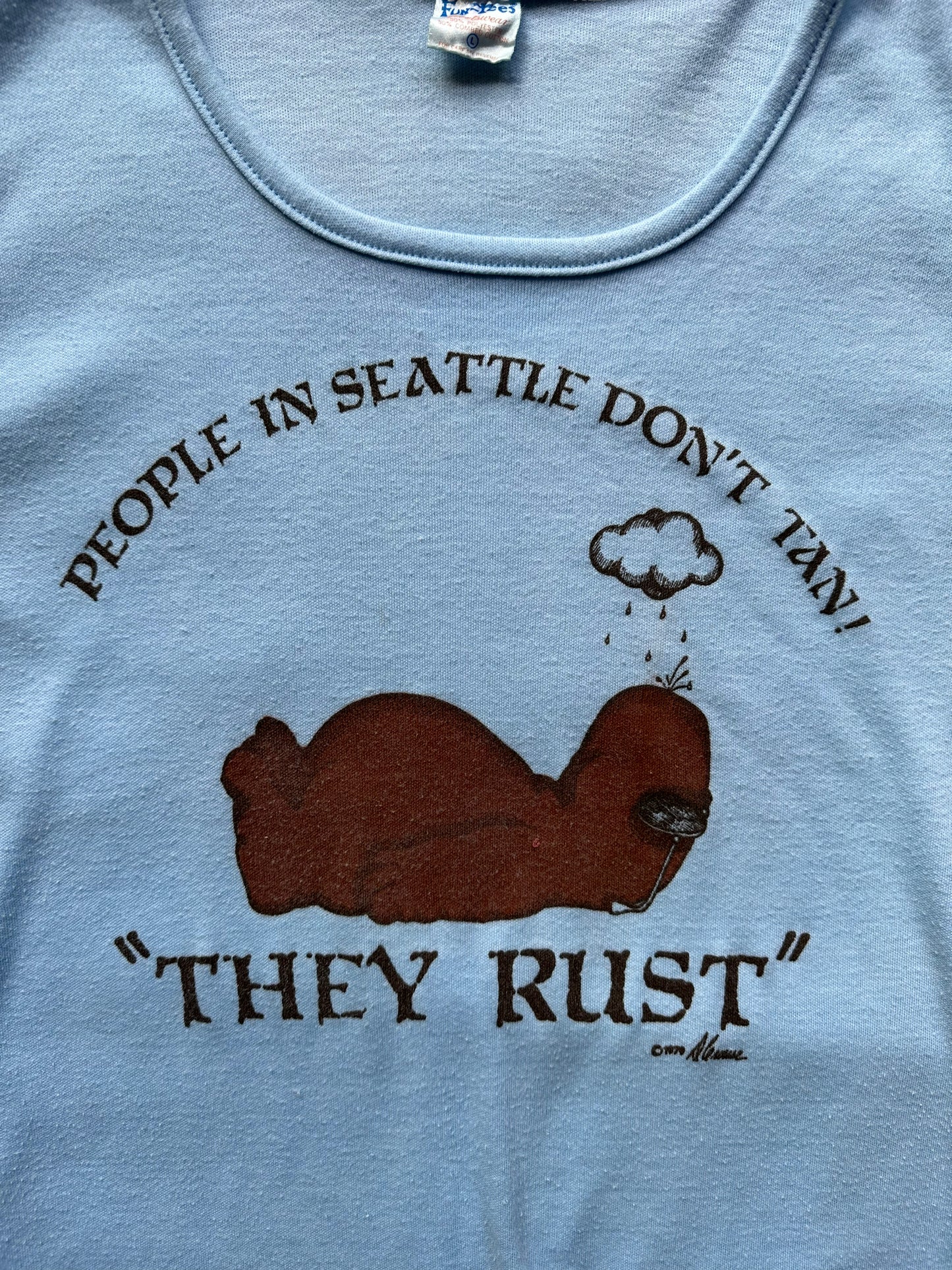 Front Detail Graphic on Vintage People in Seattle Don't Tan They Rust Tee SZ L | Vintage Seattle Tourist Tees | Barn Owl Vintage Tees Seattle