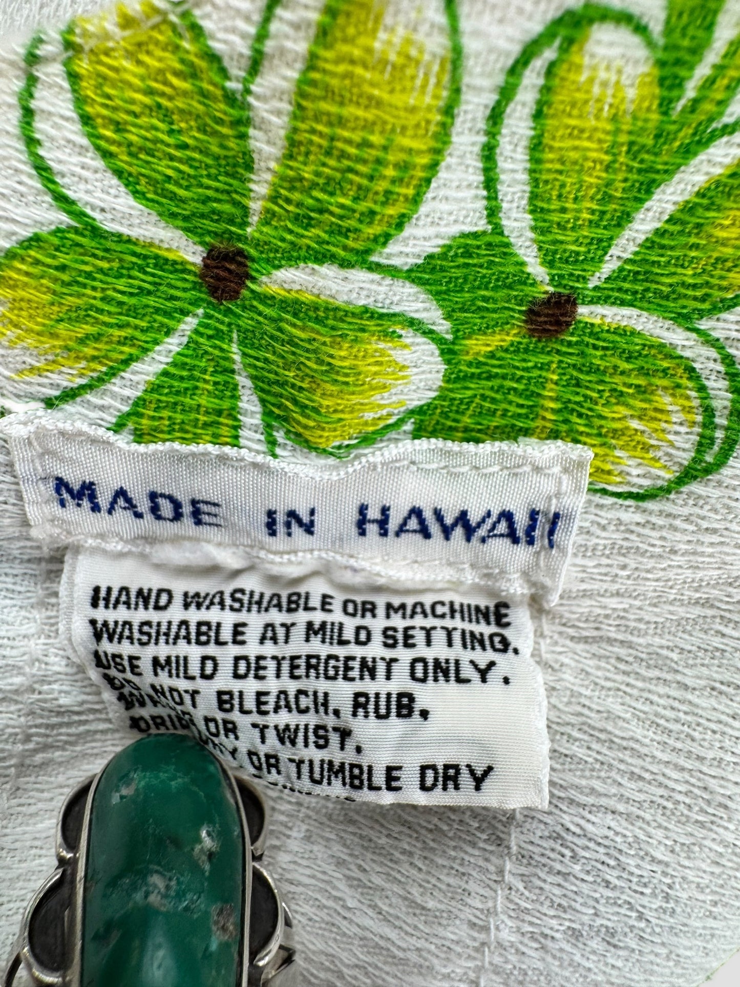 Care tag of 1960s Green Hibiscus Aloha Dress S