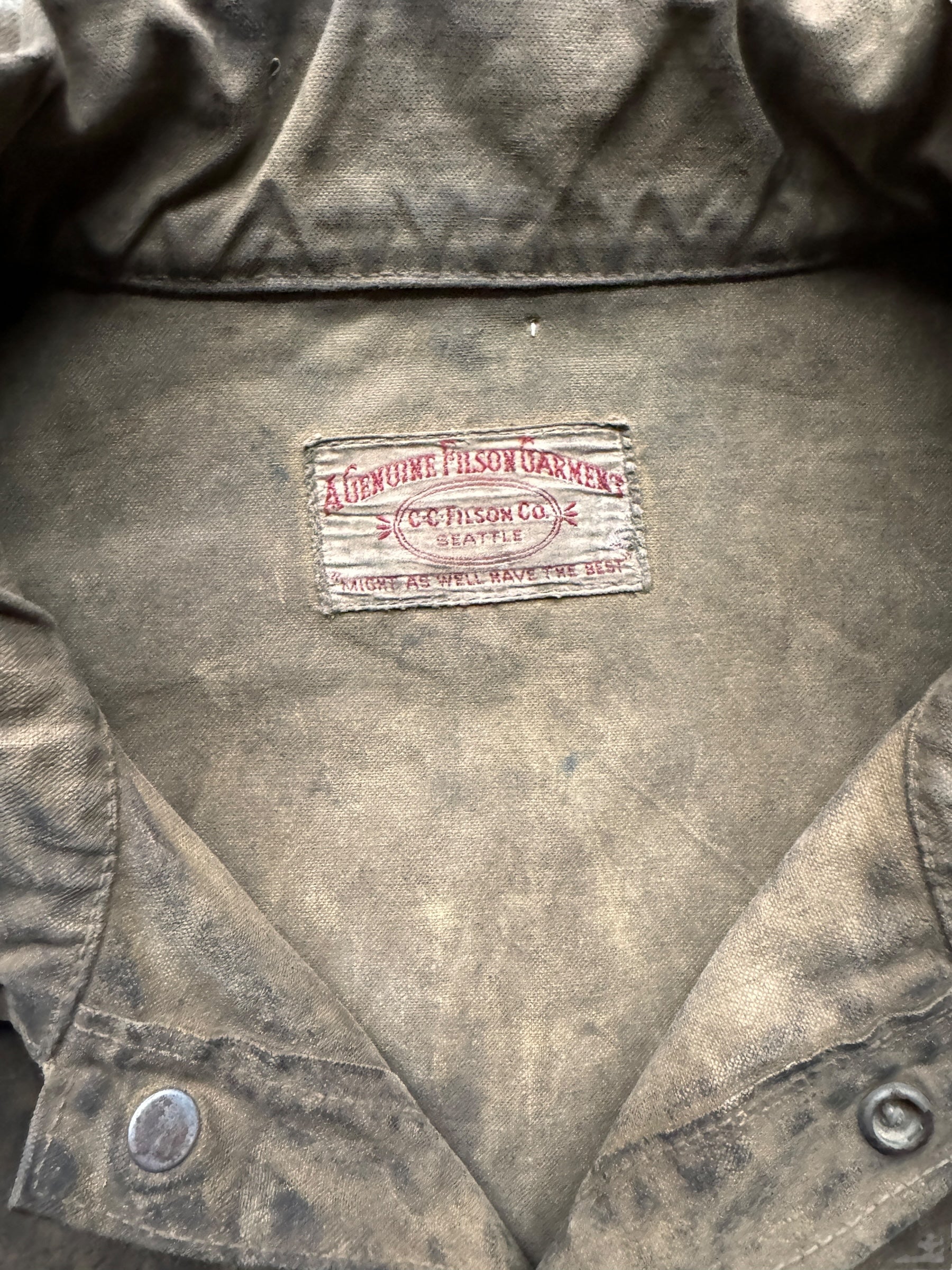 Tag View of Distressed Vintage Union Made Filson Tin Cruiser SZ XL