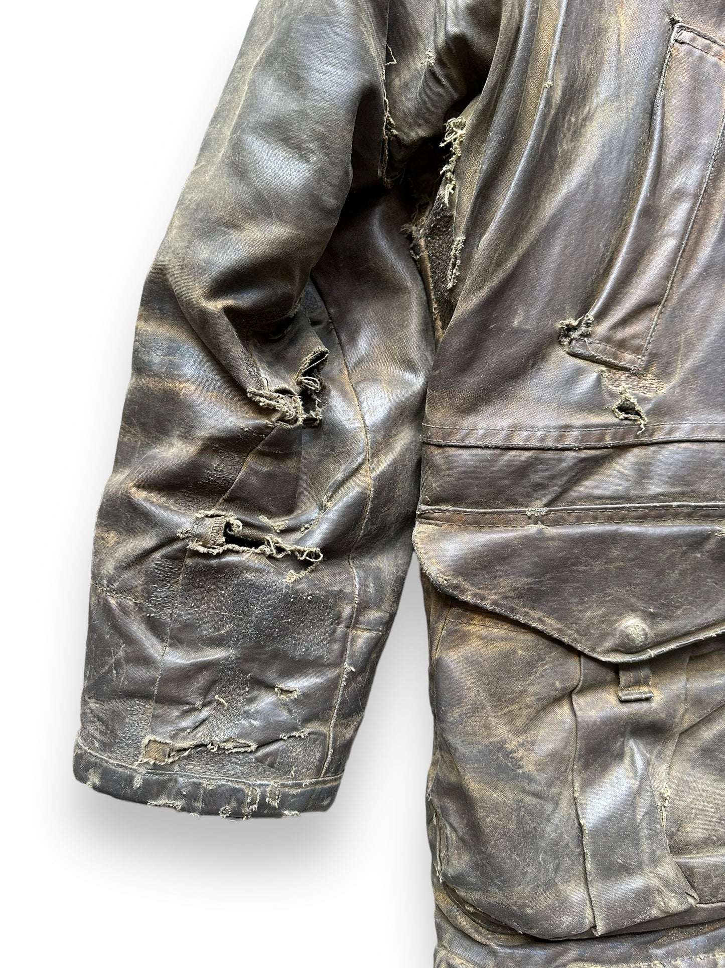 Front Right Arm with Repairs on Filson Nasty Boy Tin Cloth Field Jacket SZ 42 | Filson Tin Cloth Jacket | Vintage Workwear Seattle