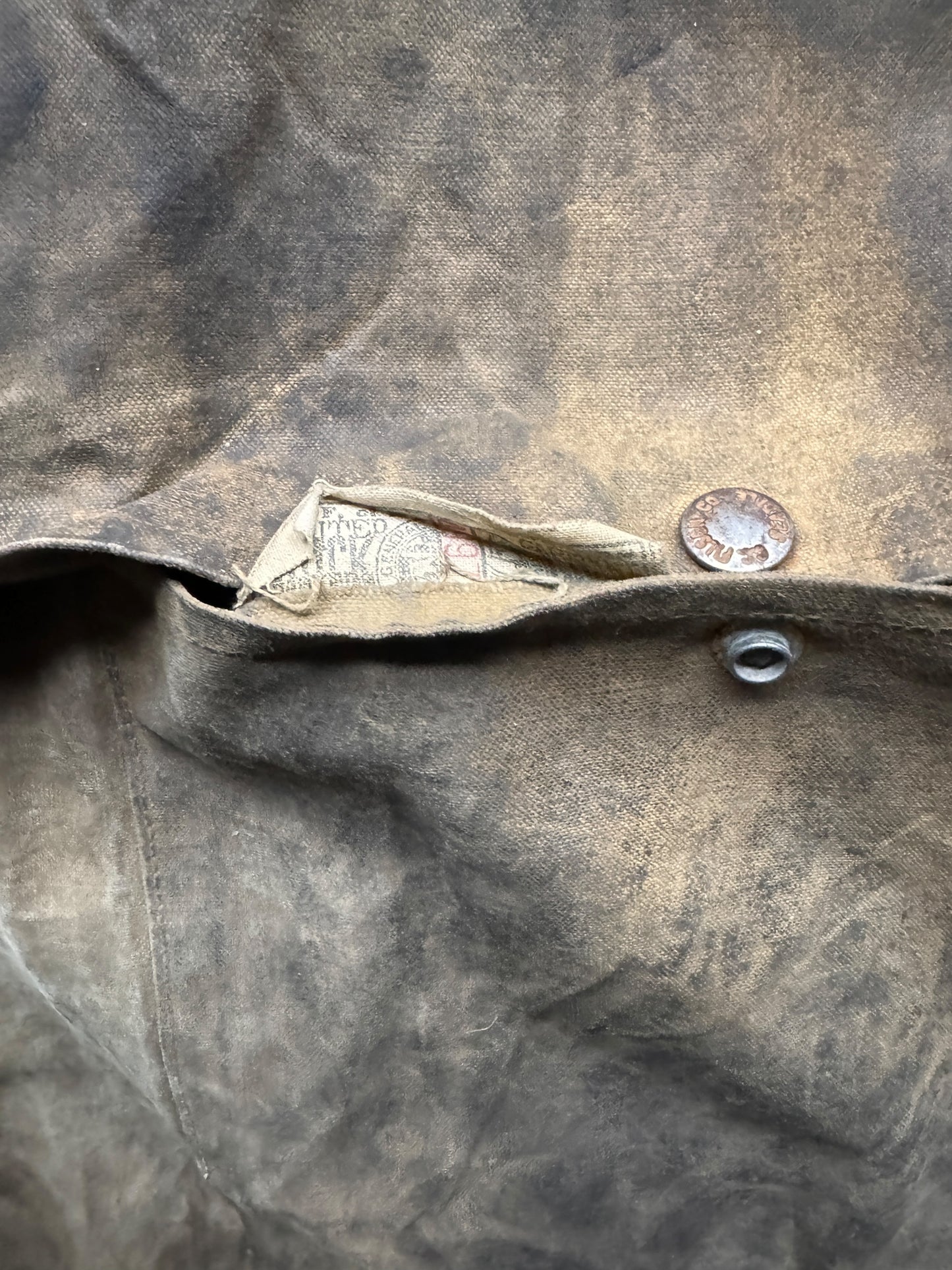 Union Worker Tag in Pocket of Distressed Vintage Union Made Filson Tin Cruiser SZ XL