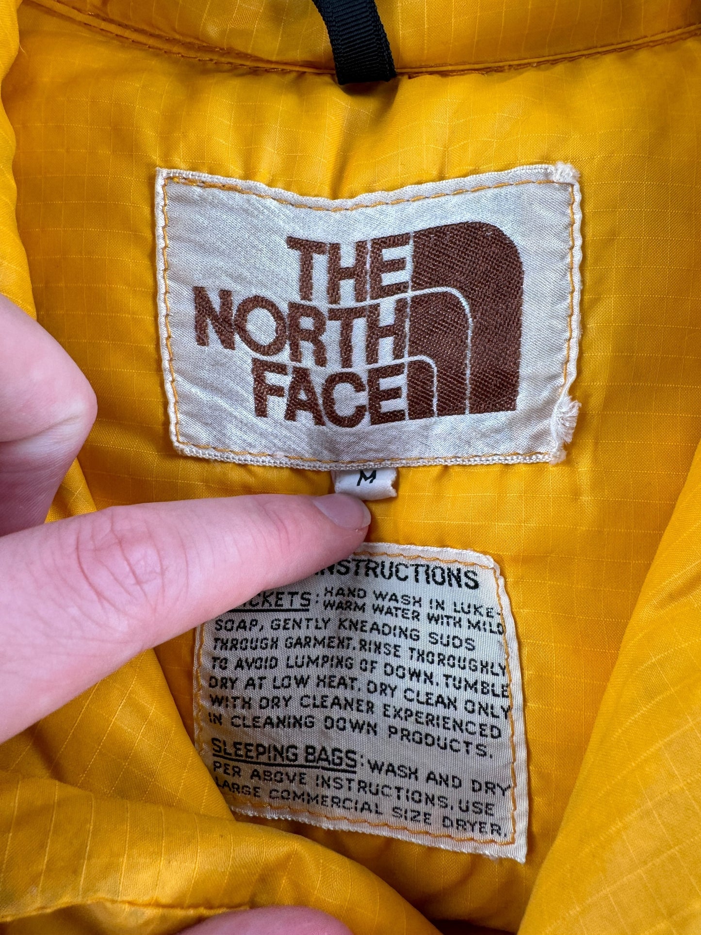 Tag on Vintage North Face Mustard Yellow Down Vest SZ M