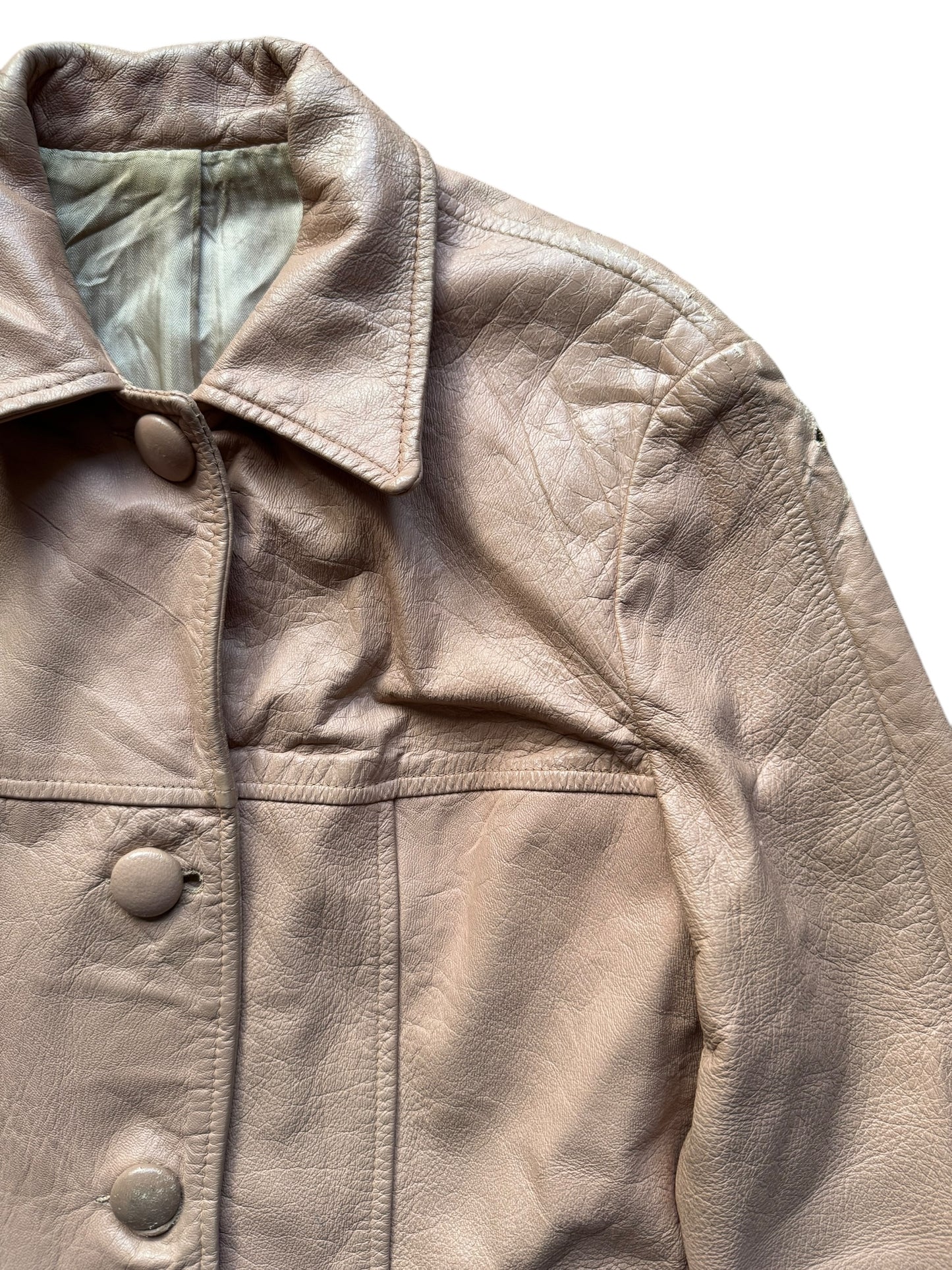 Front left shoulder view of 1940s Pale Pink Leather Jacket M