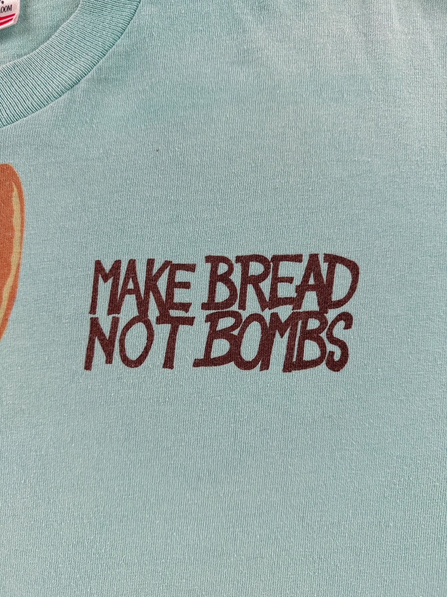 Graphic of Vintage Make Bread Not Bombs Tee SZ L