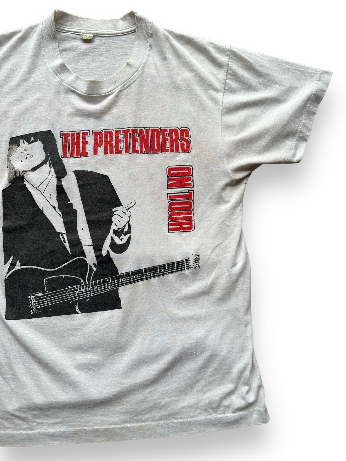Front Left View of Vintage Pretenders On Tour Bootleg Tee SZ L | Barn Owl Vintage Clothing | Vintage Chrissie Hynde Rock Tees Seattle