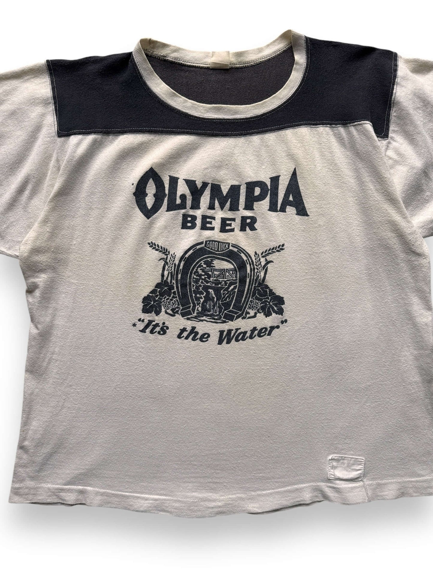 front close up of Vintage Olympia Beer "It's The Water" Football Jersey SZ XL