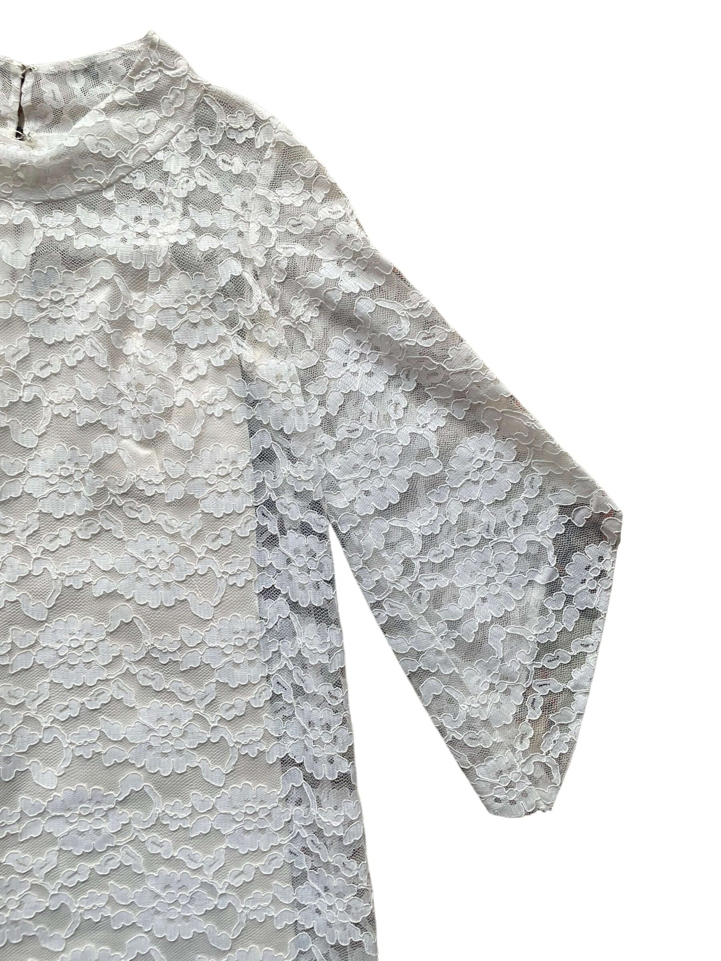 Front left sleeve of Vintage 1960s Lace Mini Dress | Barn Owl Vintage Dresses | Seattle Vintage Ladies Clothing