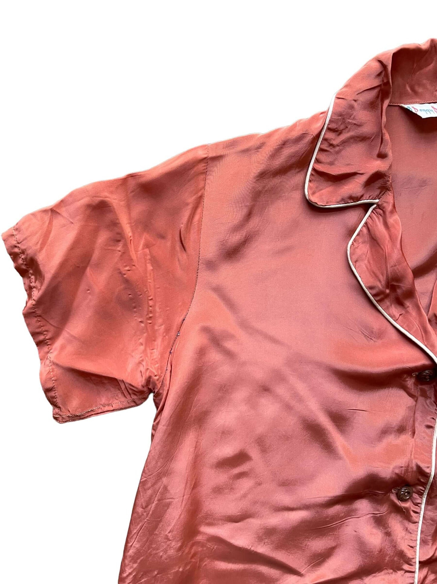 Front right shoulder view of 1940s Peggy Prim Satin PJ Top L-XL