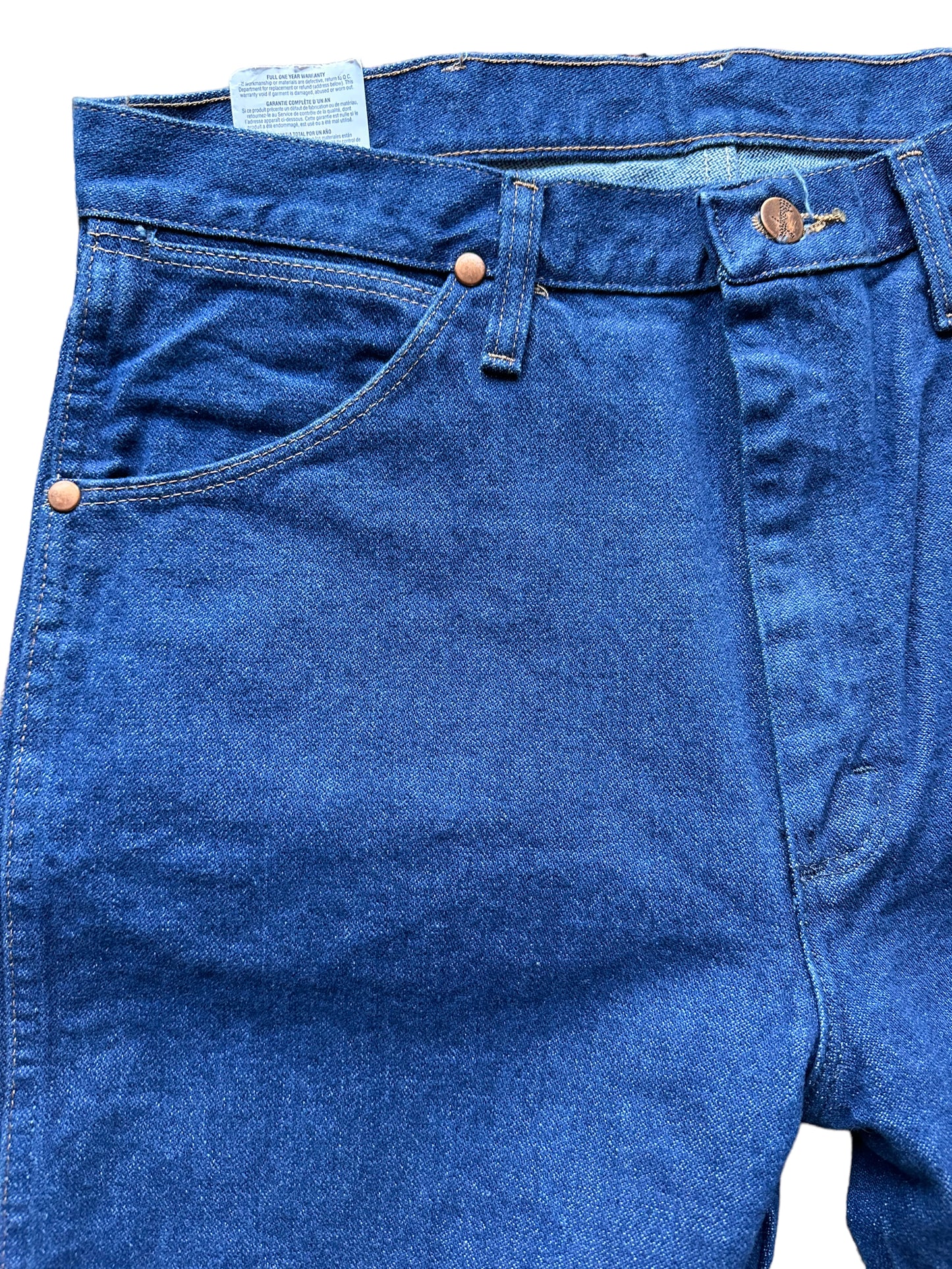 Front right side view of Vintage 90s Deadstock Wrangler Cowboy Cut Denim 33x36 | Seattle Vintage Jeans | Barn Owl Vintage