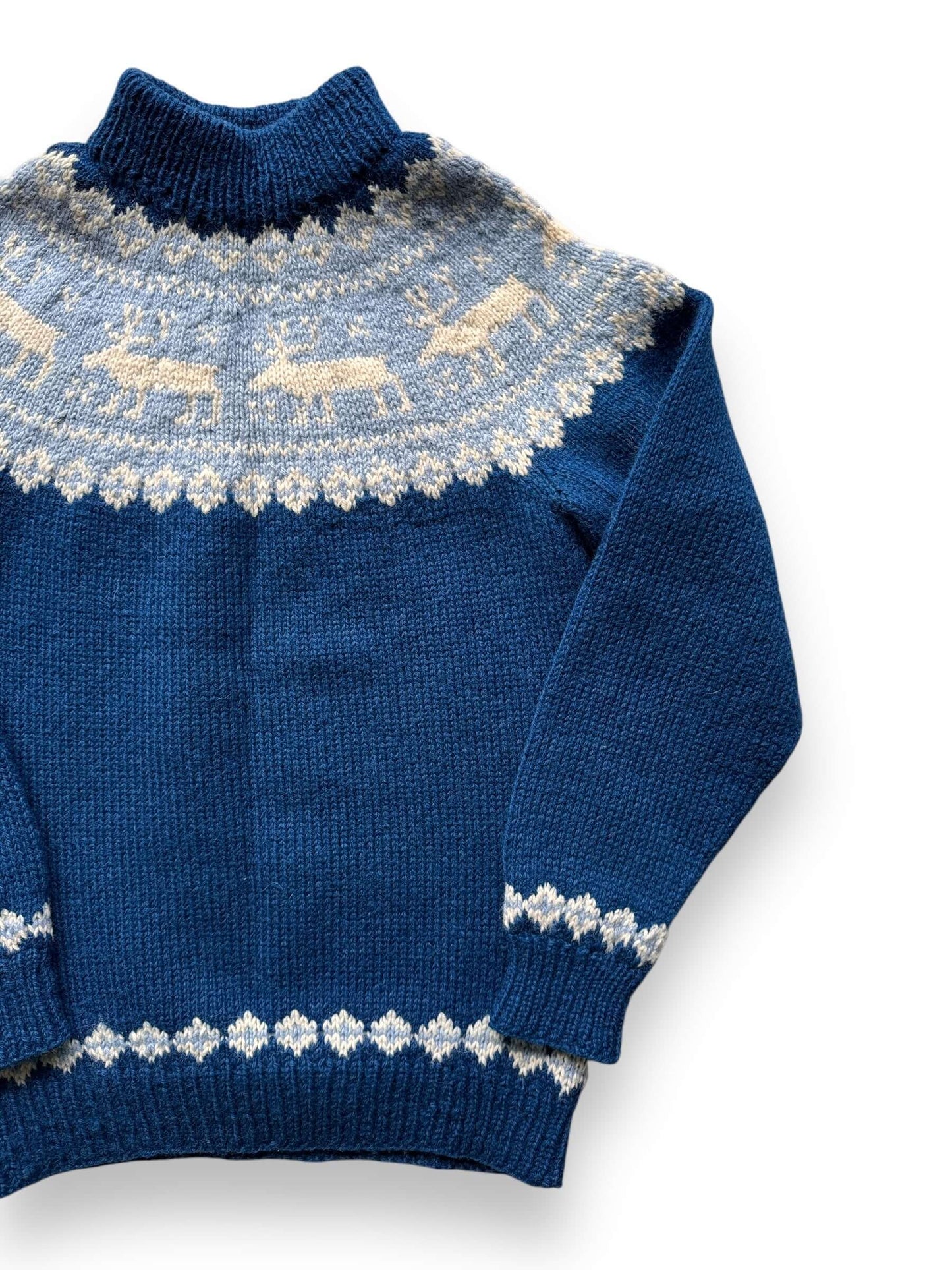 front left of Vintage Blue Reindeer Danish Wool Sweater SZ S