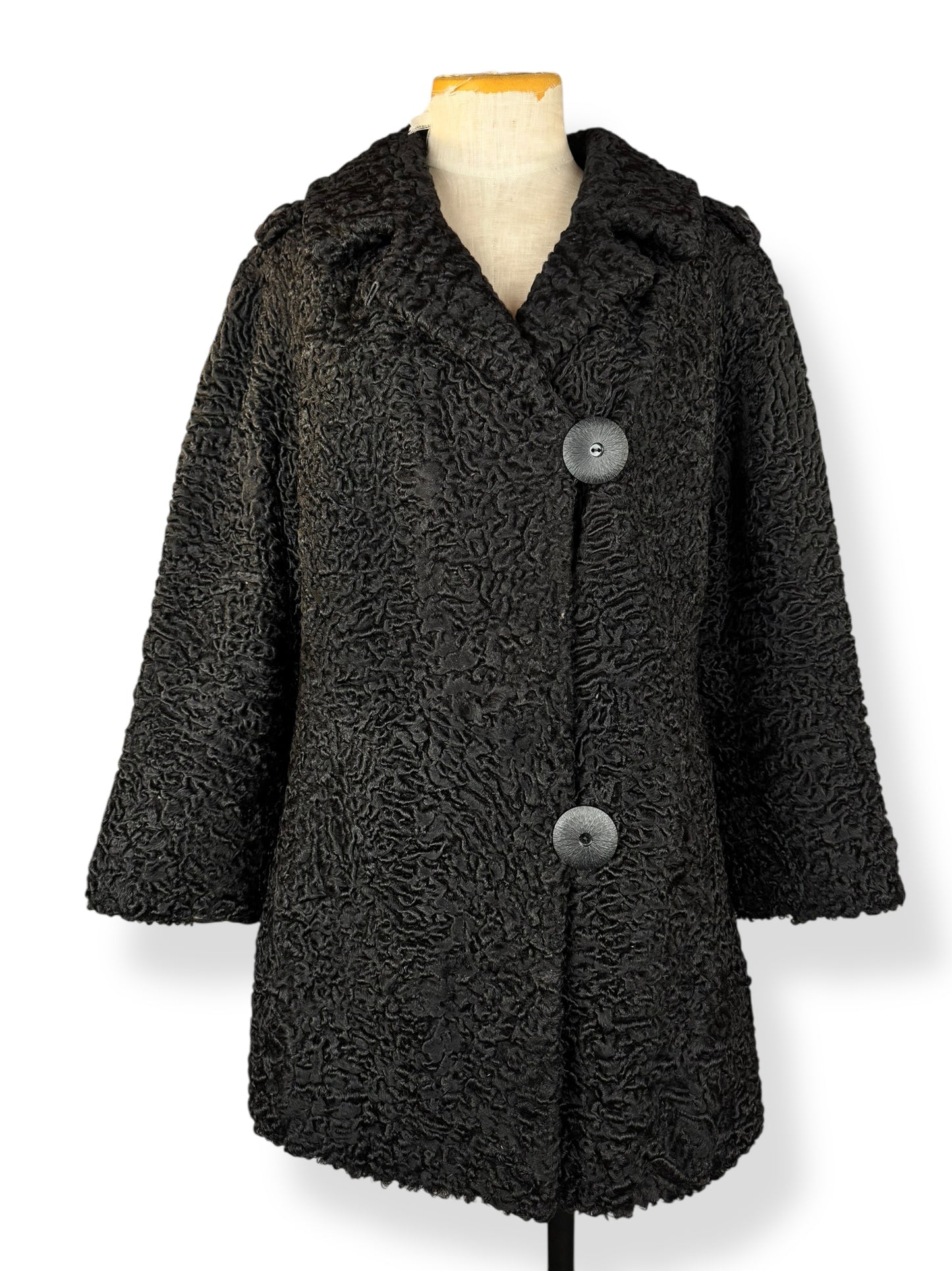 Front view of 1960s Uhlemann Furs Curly Lamb Coat L