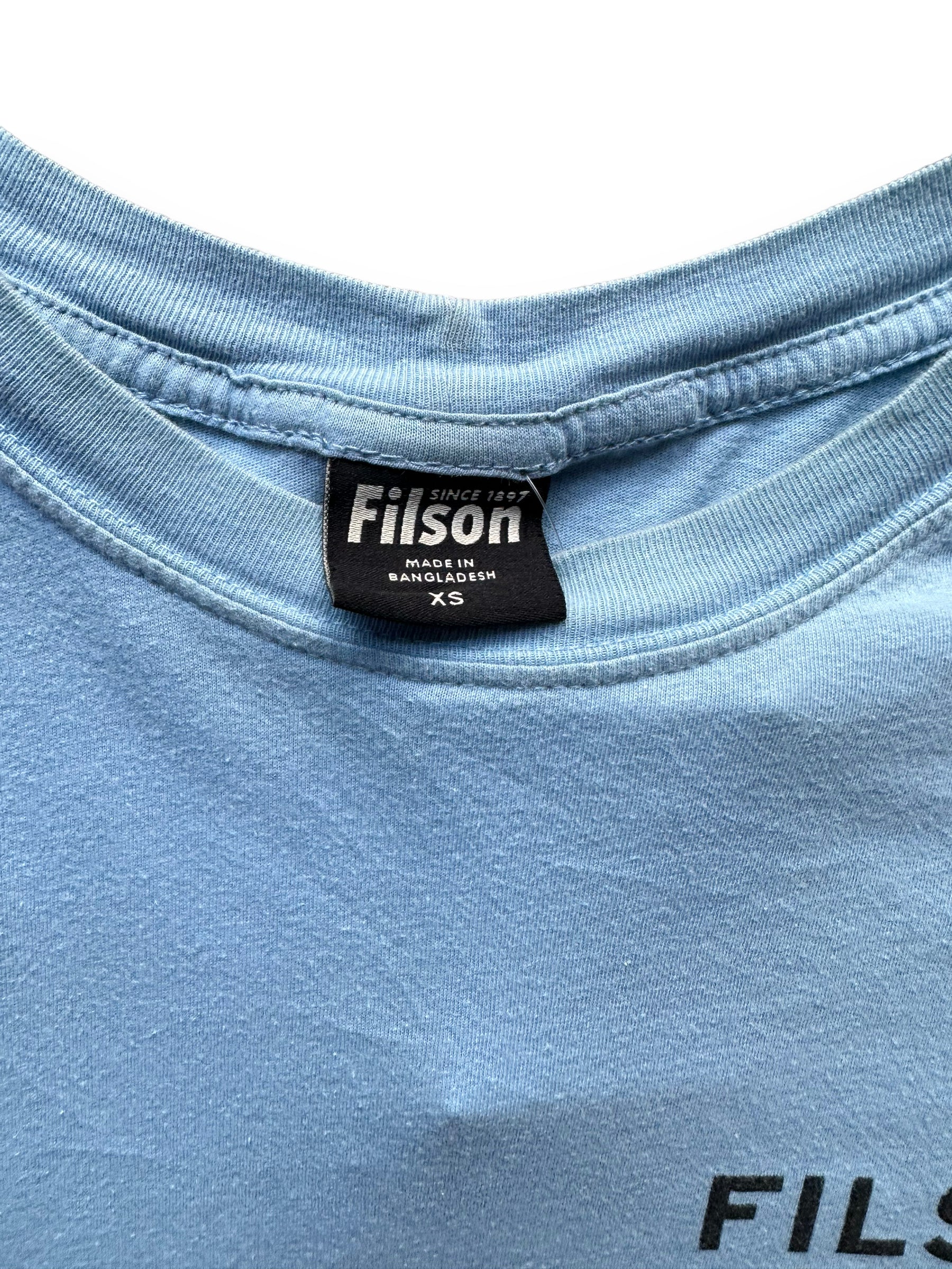 Tag View of Light Blue Filson Eagle Graphic Tee SZ XS |  Barn Owl Vintage Goods | Vintage Filson Workwear Seattle