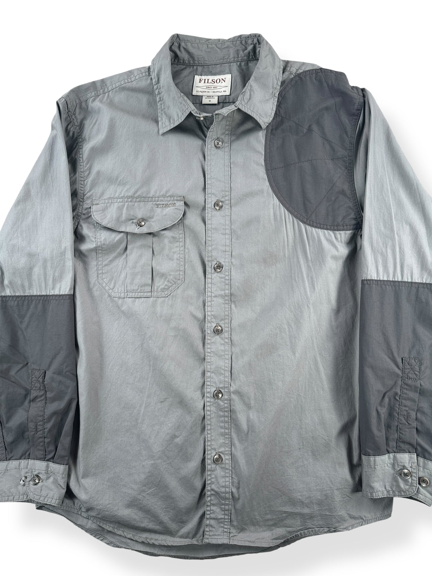 Front Close Up of Filson Light Olive Left Handed Light Shooting Shirt SZ M