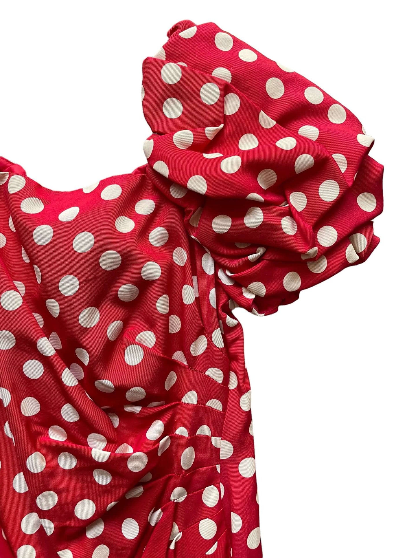 Front left sleeve view of 1980s Poofy Red Polka Dot Wiggle Dress M-L