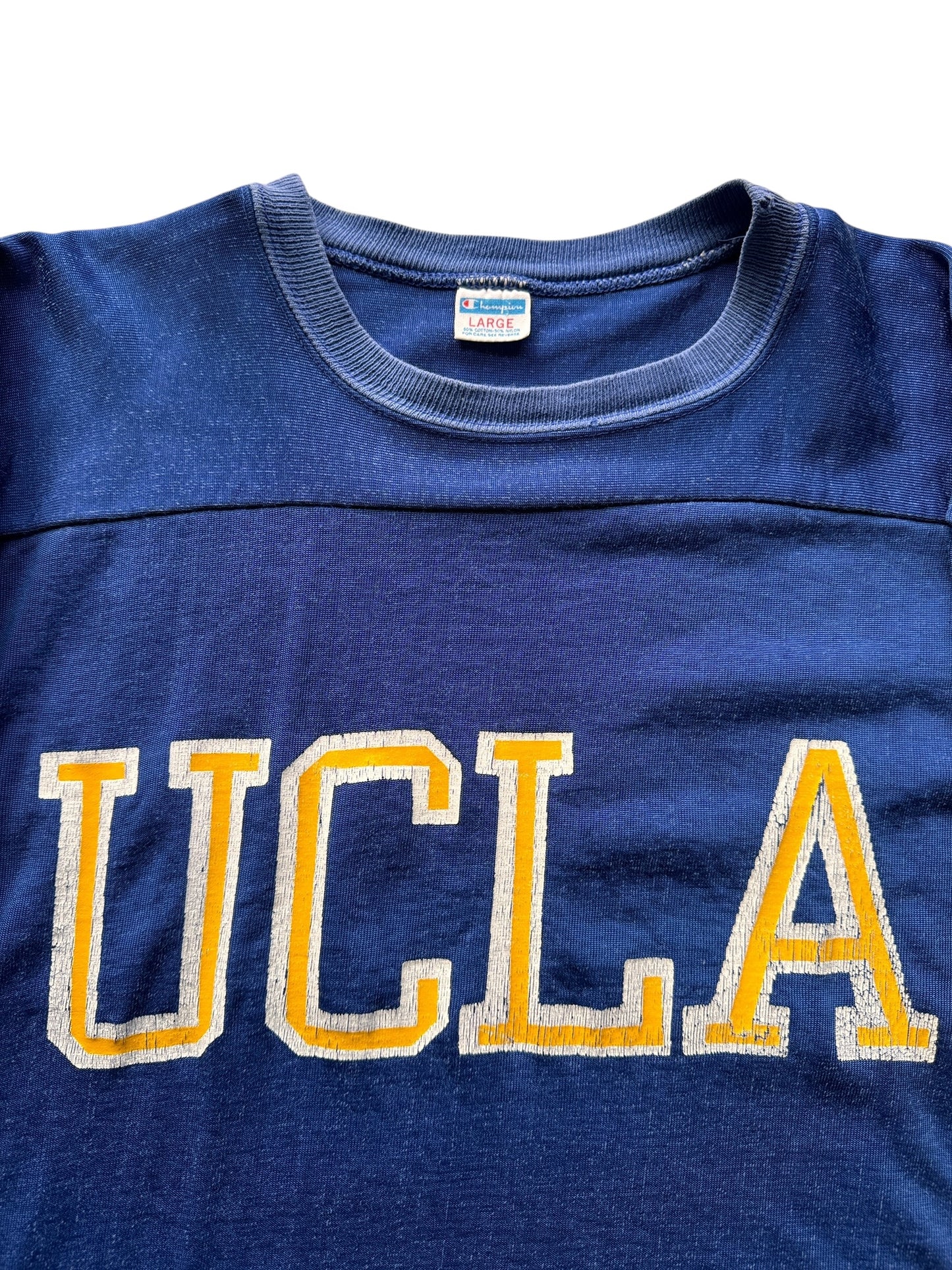 Front Graphic of Vintage Champion Blue Bar UCLA Chopper Jersey SZ L AS IS