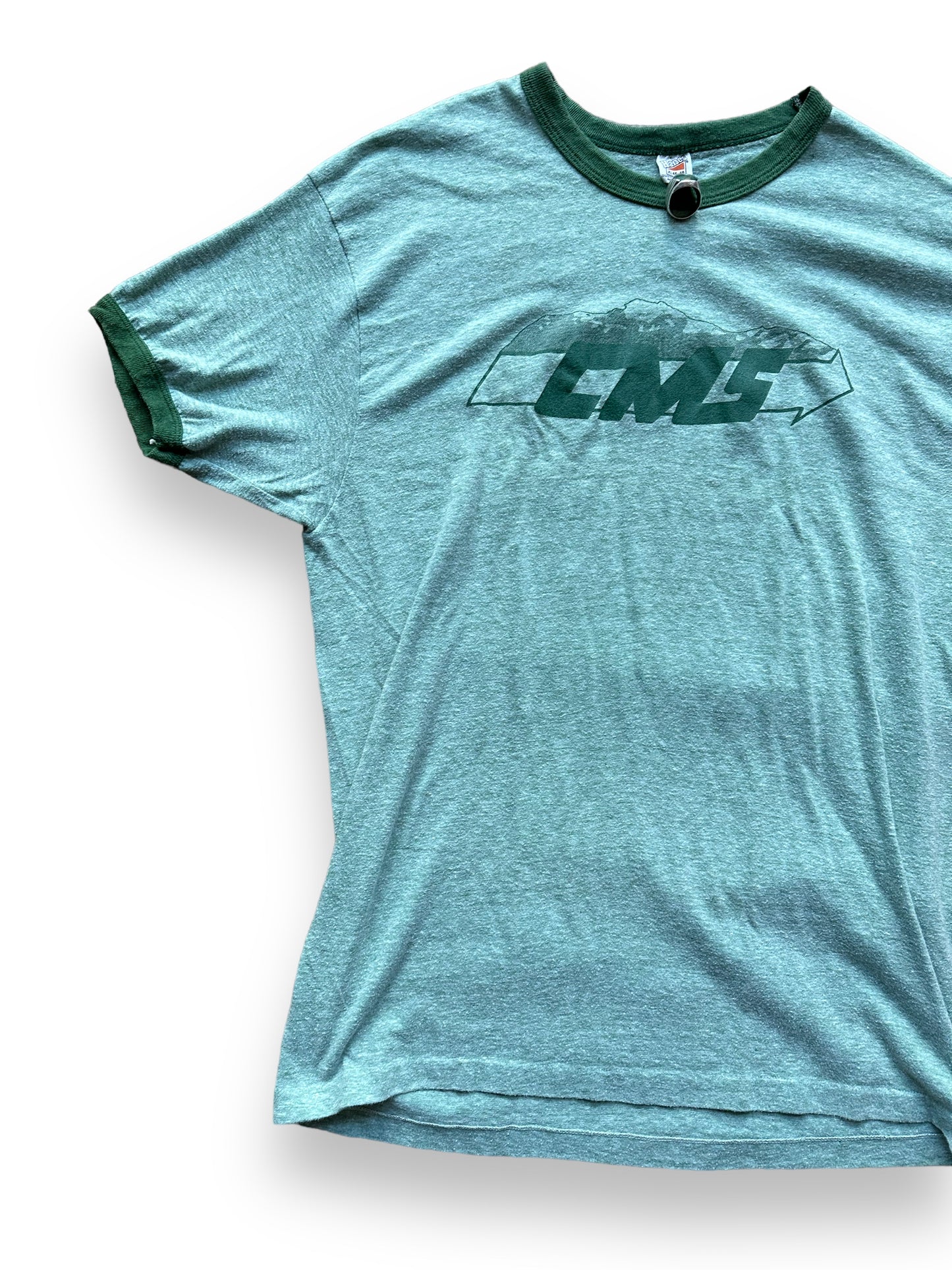 Front Right View of Vintage Cascade Moving Green Ringer Tee SZ XL | Vintage Graphic T-Shirts Seattle | Barn Owl Vintage Tees Seattle